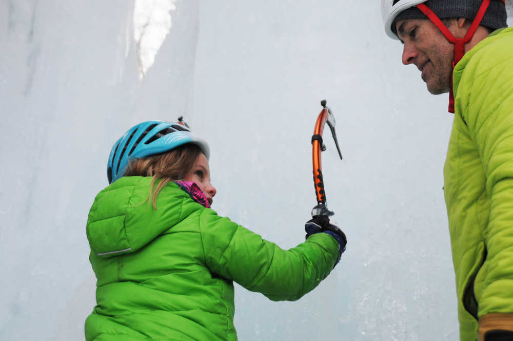 Photo by Elizabeth Earl/Peninsula Clarion Avery Walden, 9, practices climbing an ice wall her father set up in the back yard of their home on Sunday, Dec. 18, 2016 near Soldotna, Alaska. Avery and Chris Walden, along with a family friend, will embark on an eight-day expedition to summit Mt. Kilimanjaro in Tanzania. If they succeed, Avery Walden will be the youngest female ever to summit the 19,341-foot mountain.