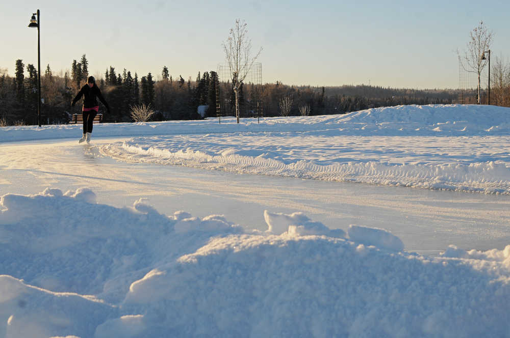 Photo by Elizabeth Earl/Peninsula Clarion A skater makes her way around the ice skating trail at Soldotna Creek Park on Friday, Dec. 29, 2016 in Soldotna, Alaska. The City of Soldotna's Department of Parks and Recreation set up the path in early December for any visitor to the park to enjoy.