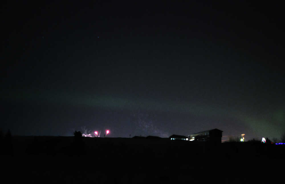 Ben Boetter/Peninsula Clarion  Fireworks in celebration of the New York explode over Kenai's south beach on Jan. 1, 2017 in Kenai.