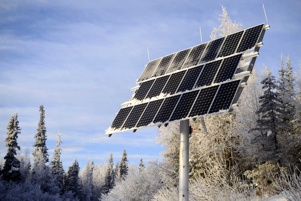 Ben Boettger/Peninsula Clarion An array of photovoltaic solar panels generate electricity from the winter sunlight at the Kenai National Wildlife Refuge headquarters on Wednesday, Jan. 4 in Soldotna.