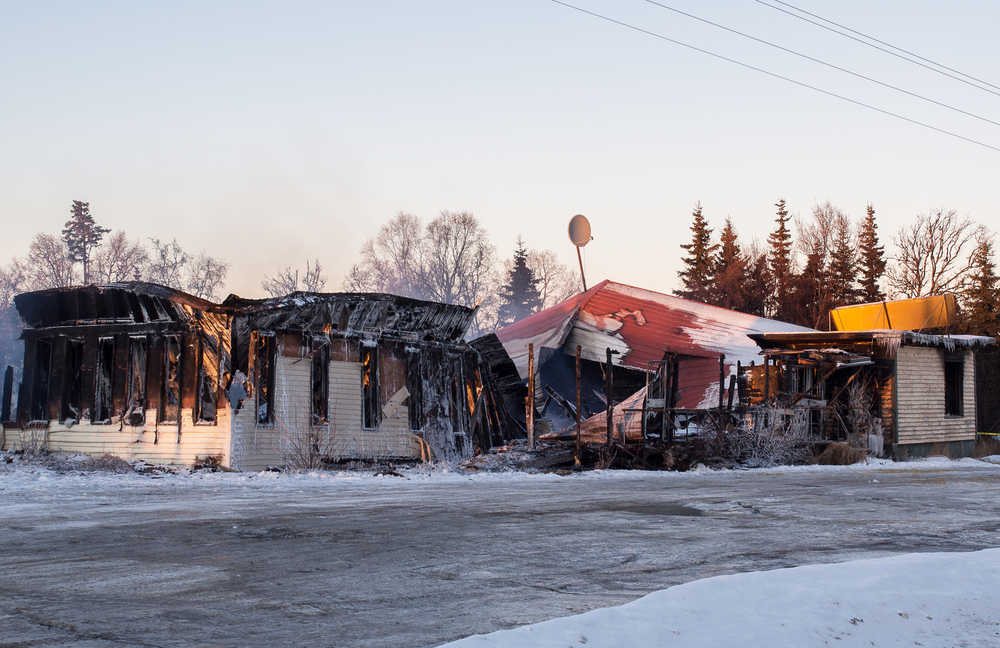 Photo courtesy Joe Kashi The remains of the Clam Shell Lodge continue to burn slightly where the establishment, closed in 2011, once stood in this photo taken Saturday, Jan. 7, 2017 in Clam Gulch, Alaska. The building burned down Friday night.