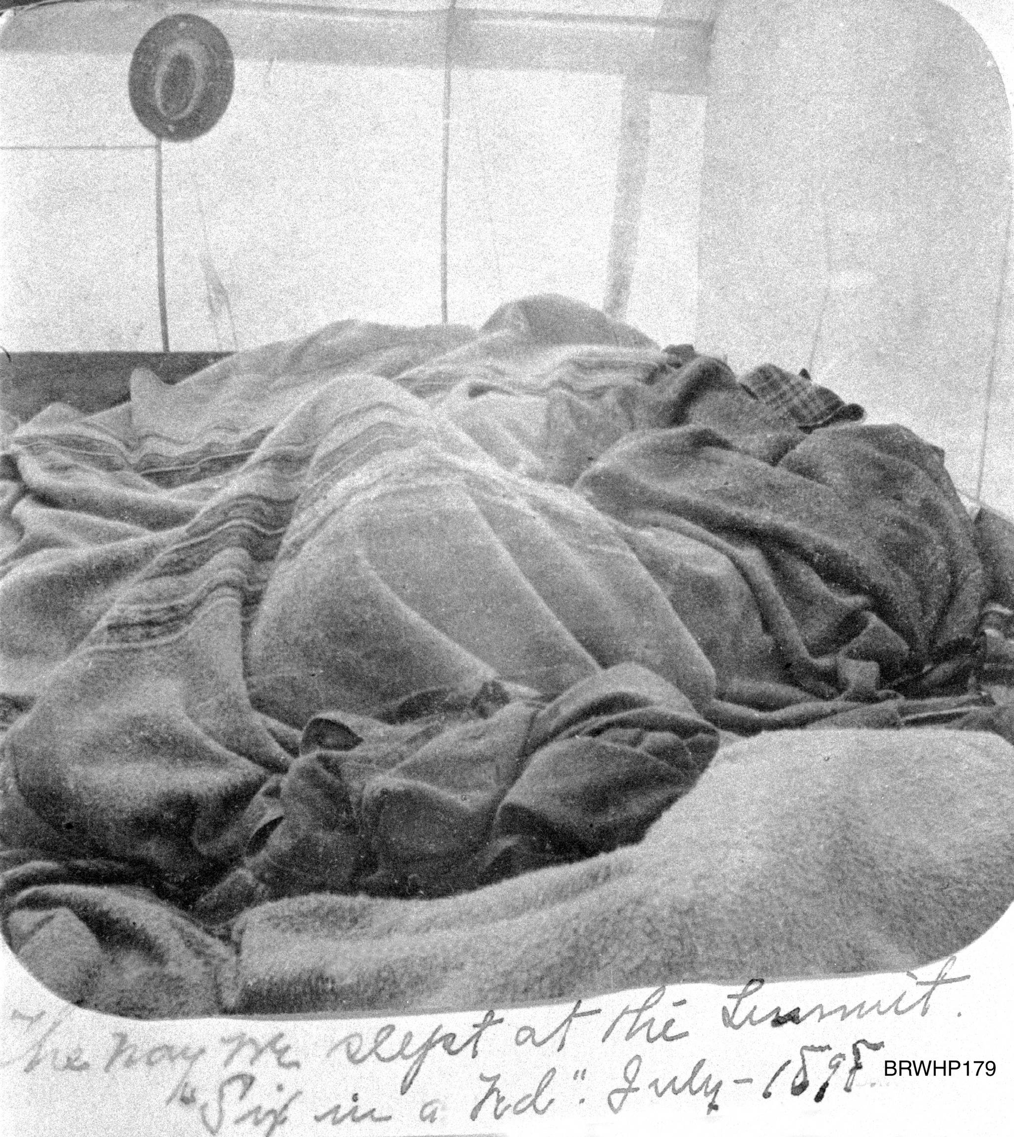 “The way we slept at the Summit, six in a bed.” The Brackett family asleep in a tent at the summit of the White Pass Trail some 20 miles north of Skagway, circa July 1898. (Courtesy Photo | National Park Service, Klondike Gold Rush National Historical Park, Brackett Family Collection, BRWHP179, KLGO WS-58-5311)