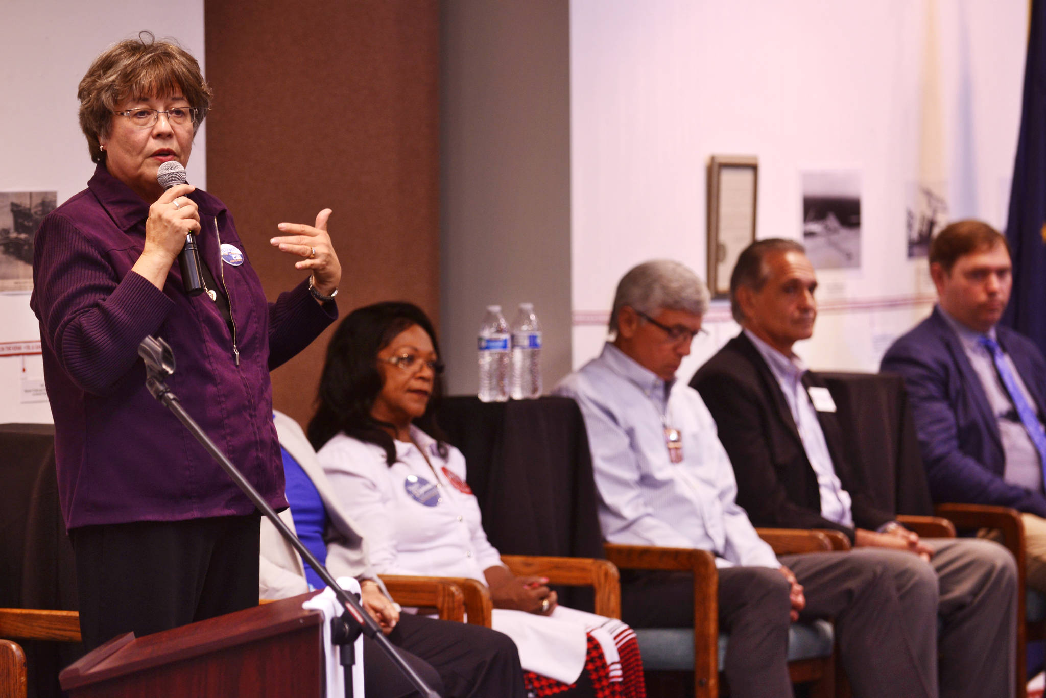 Lieutenant Governor candidates Debra Call (standing), Edie Grunwald, Sharon Jackson, Byron Mallot, Kevin Myer, and Stephan Wright answer questions at a Kenai and Soldotna Chamber of Commerce candidate forum on Wednesday, August 1, 2018 at the Kenai Chamber of Commerce and Visitors Center in Kenai, Alaska. (Ben Boettger/Peninsula Clarion)