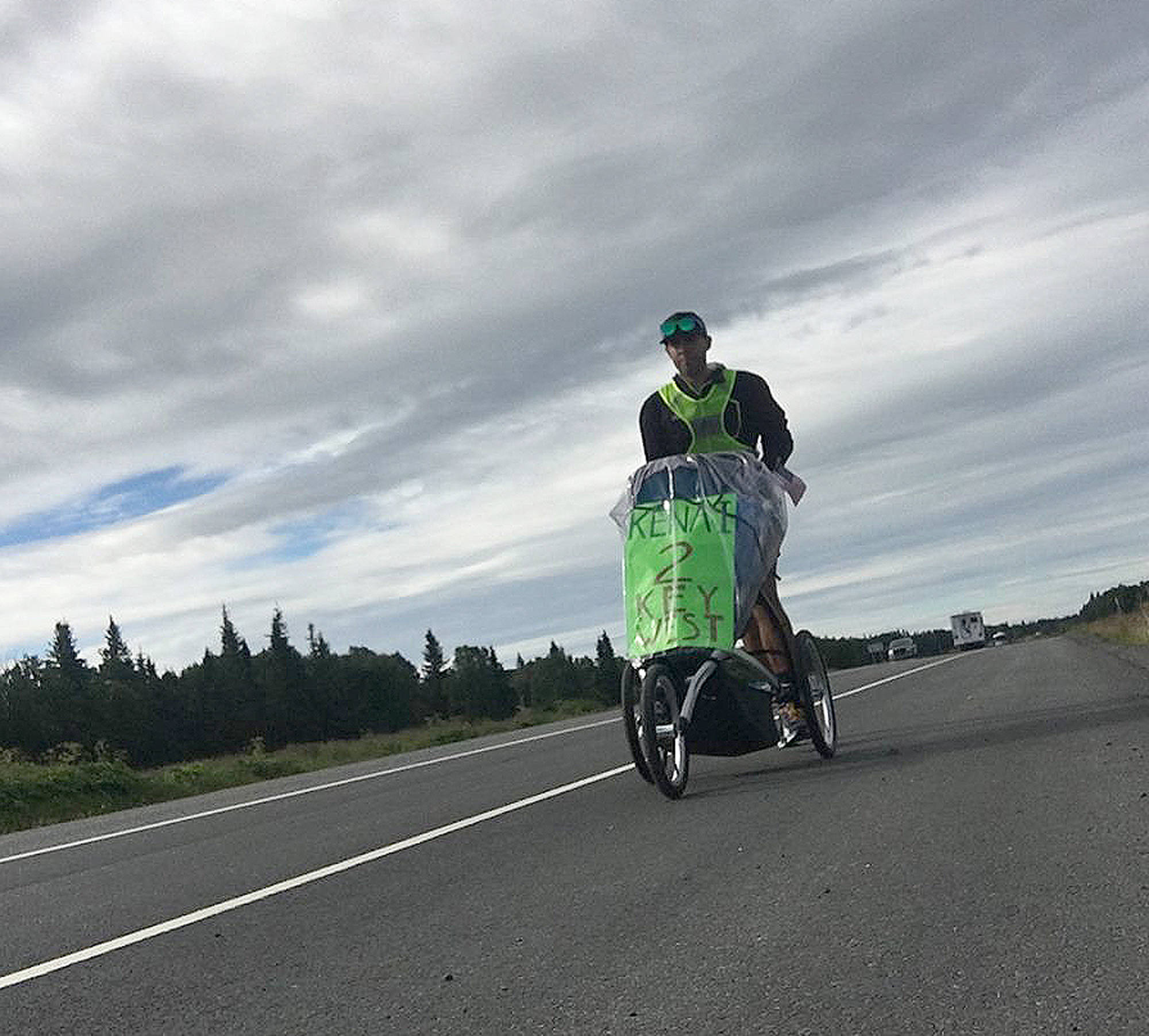 Pete Kostelnick runs north on the Sterling Highway Tuesday morning on the first day of an attempt to run self-supported to Key West, Florida. (Photo provided by Pete Kostelnick)