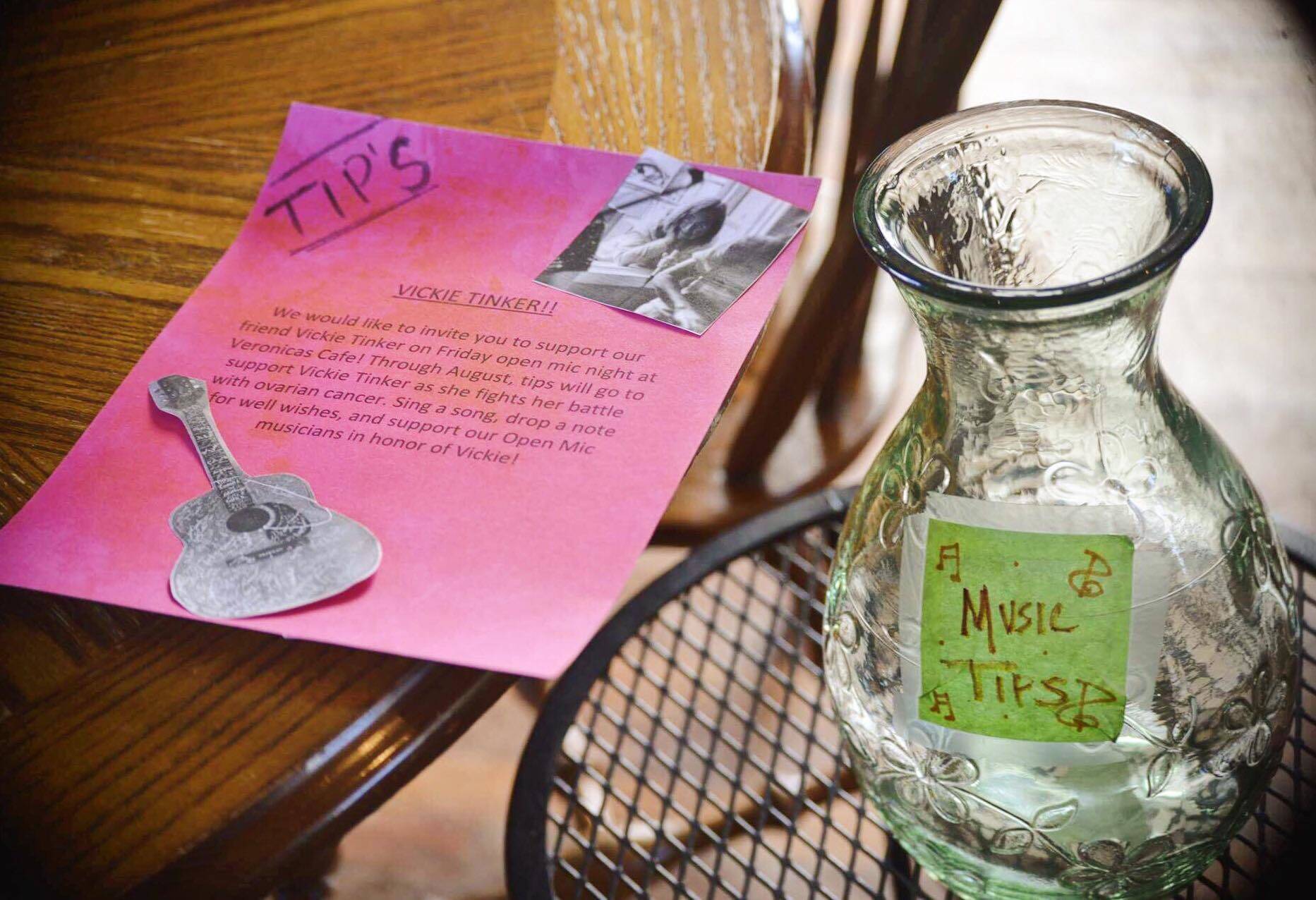 This Friday, Aug. 3, 2018 photo shows a tip jar at Veronica’s Cafe’s open mic event in Kenai, Alaska. Tips collected at open mic nights throughought August at Veronica’s Cafe will go to support community member, Vickie Tinker’s ovarian cancer treatment. (Photo by Victoria Petersen/Peninsula Clarion)