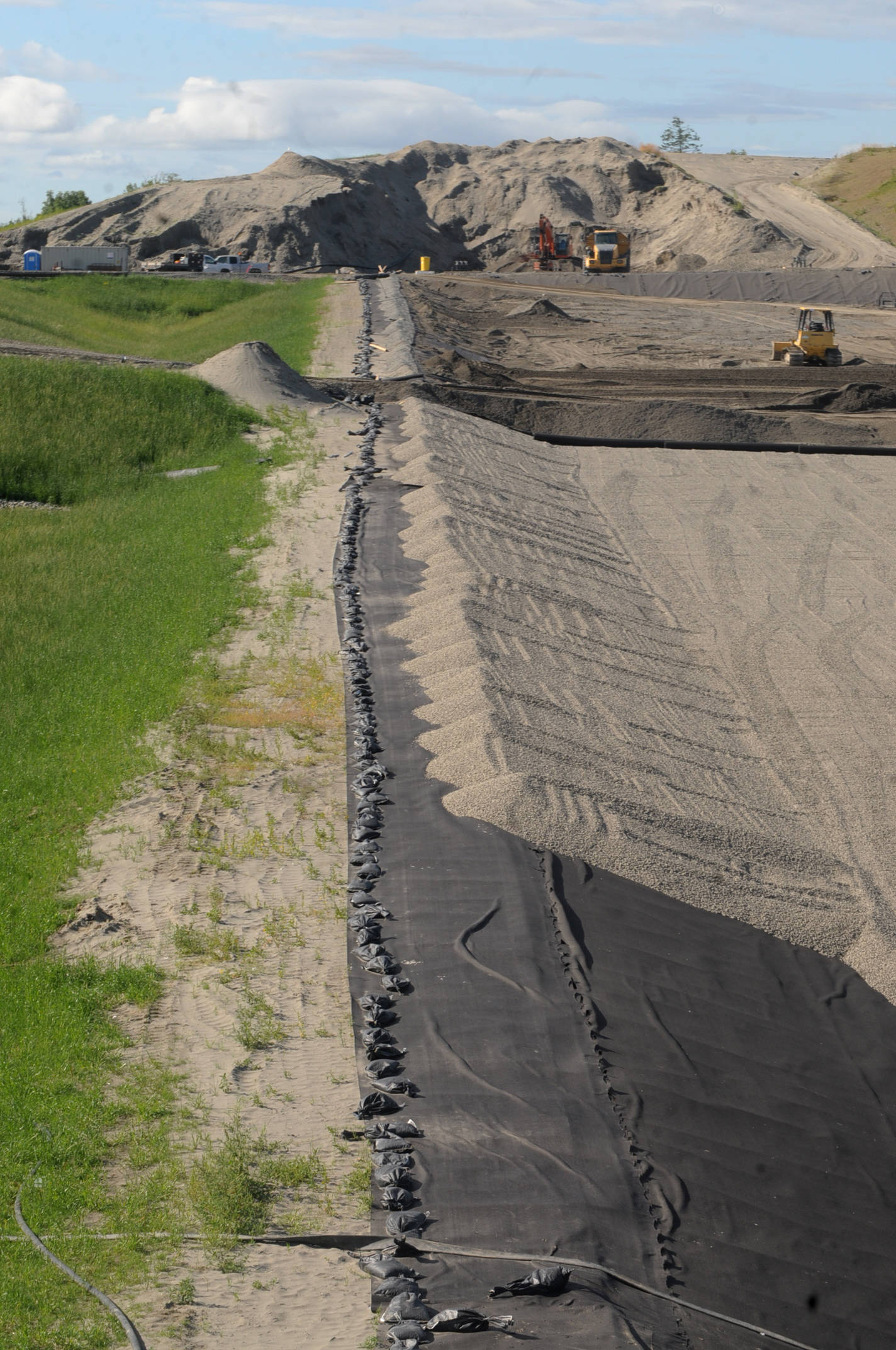 This Tuesday, Aug. 7, 2018 shows the construction of Cell 3 at Central Peninsula Landfill in Soldotna, Alaska. (Photo by Elizabeth Earl/Peninsula Clarion)