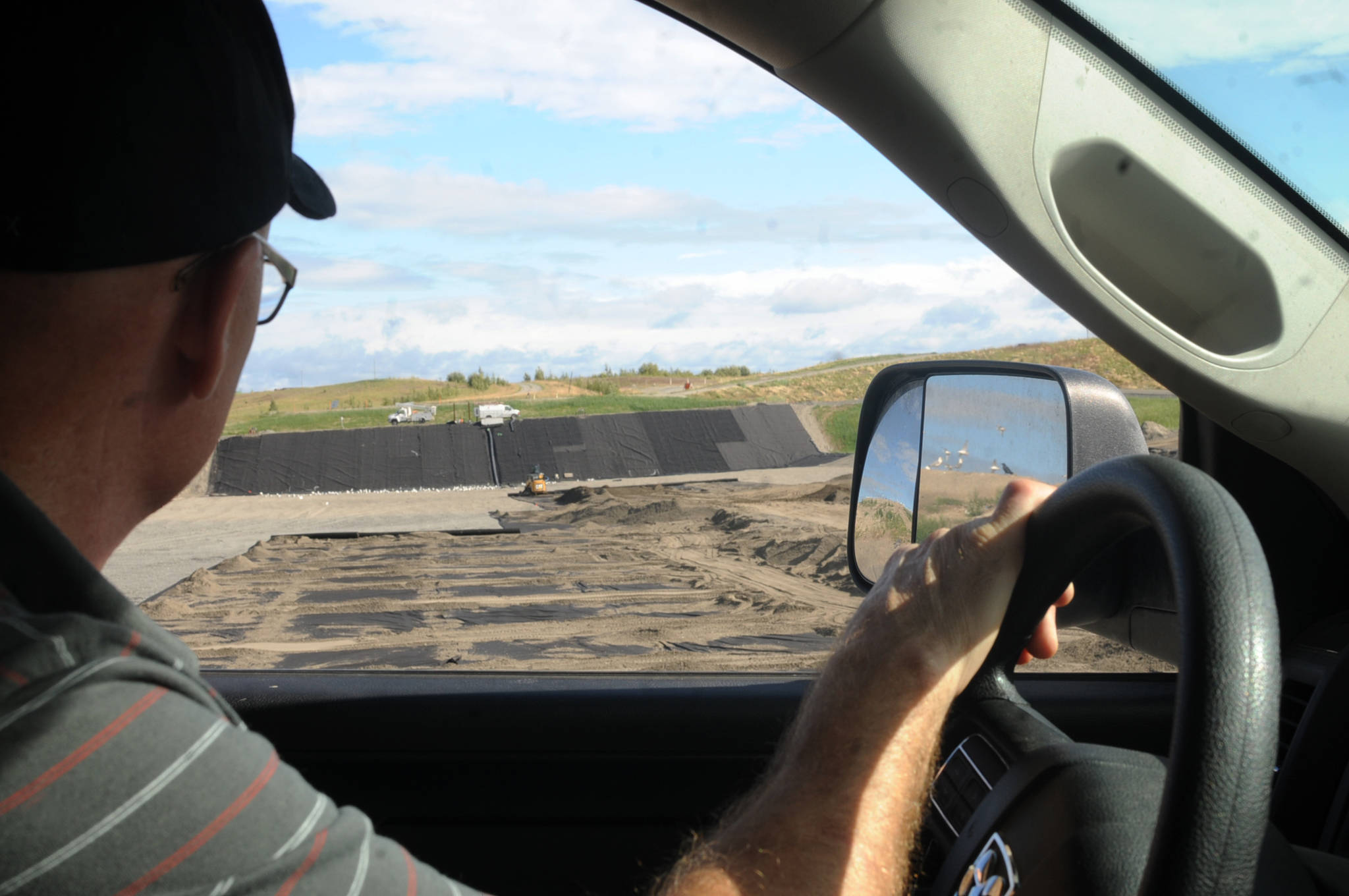 Kenai Peninsula Borough Solid Waste Department Director Jack Maryott looks out at the construction of Cell 3 at Central Peninsula Landfill on Tuesday, Aug. 7, 2018 in Soldotna, Alaska. (Photo by Elizabeth Earl/Peninsula Clarion)