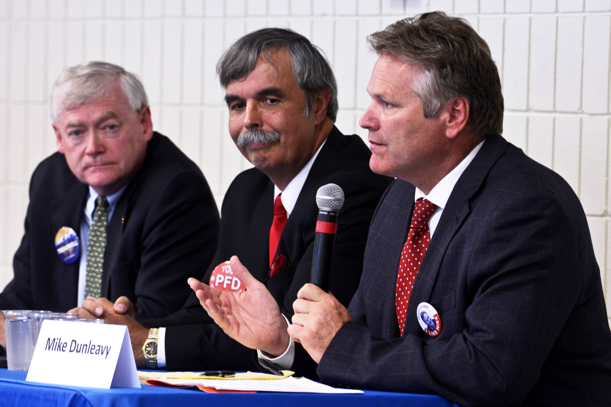Three of this year’s five Republican gubernatorial candidates — Mead Treadwell (left), Michael Sheldon, and Mike Dunleavy — speak to members of the Kenai and Soldotna Chambers of Commerce on Wednesday at the Soldotna Regional Sports Complex in Soldotna. In the primary election on August 21, voters will choose a candidate to run on the party ballot in the November 6 general election. (Ben Boettger/Peninsula Clarion)