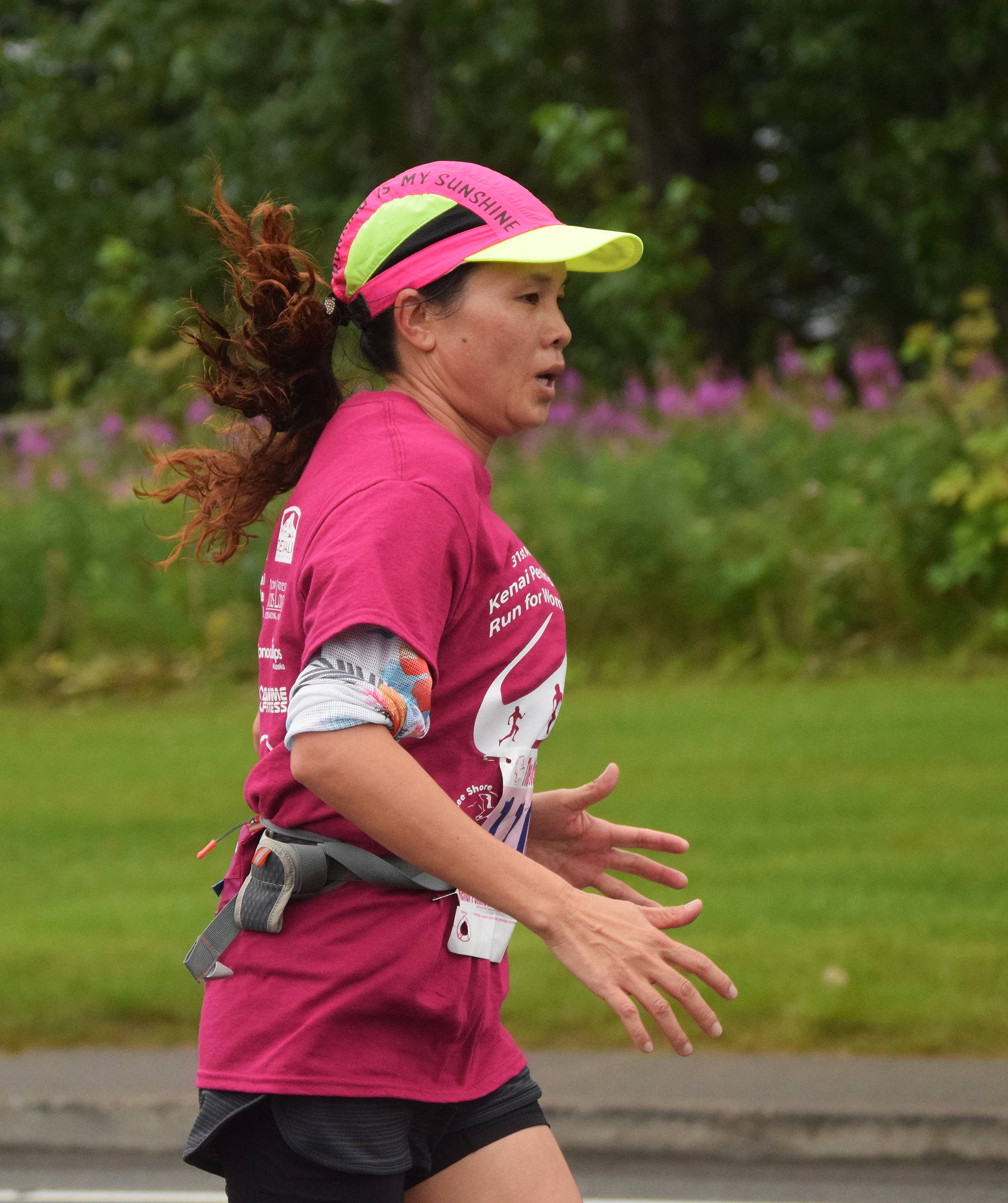 Ahlan Owens approaches the finish of the women’s 10K race Saturday morning in the 31st annual LeeShore Center Run for Women in Kenai. (Photo by Joey Klecka/Peninsula Clarion)