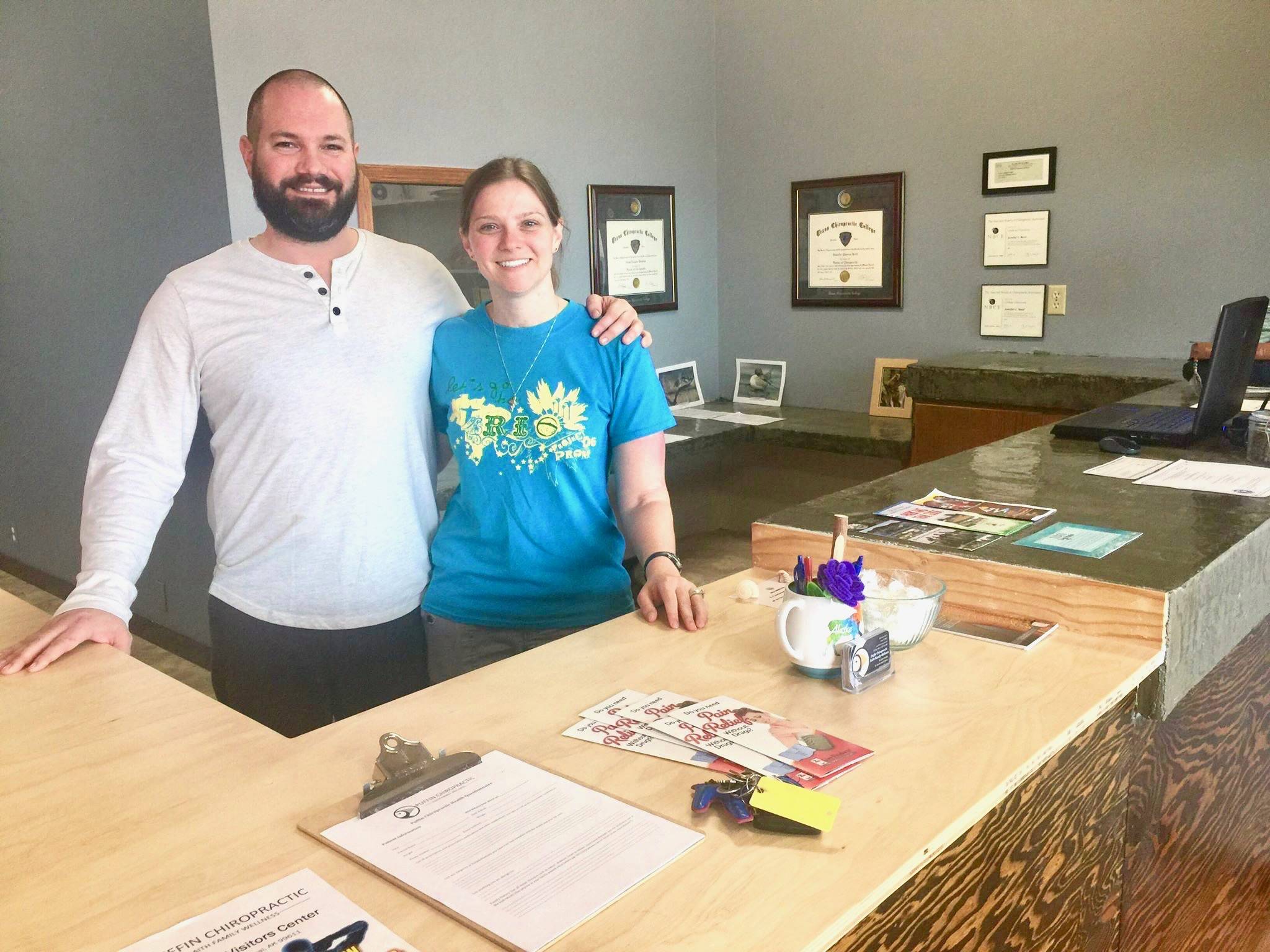 Dr. Jennifer Reed and Dr. Adam Hawkins at Puffin Chiropractic in Old Town Kenai, Alaska, on Monday, Aug. 13, 2018. (Photo by Victoria Petersen/Peninsula Clarion)