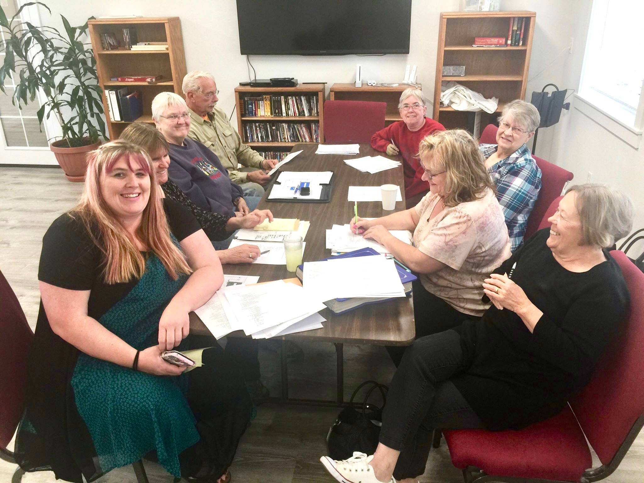 Sterling Area Senior Citizens Inc. board members and volunteers Kristie Bass, Lynn Near, Dee Duvall, Dale Lundell, Linda Bond, Sandy Bailey, Janet Jones and Jacquie Turpin met to discuss plans for the Sterling Street Fair at the Sterling Senior Center in Sterling, Alaska, on Monday, Aug. 13, 2018. (Photo by Victoria Petersen/Peninsula Clarion)