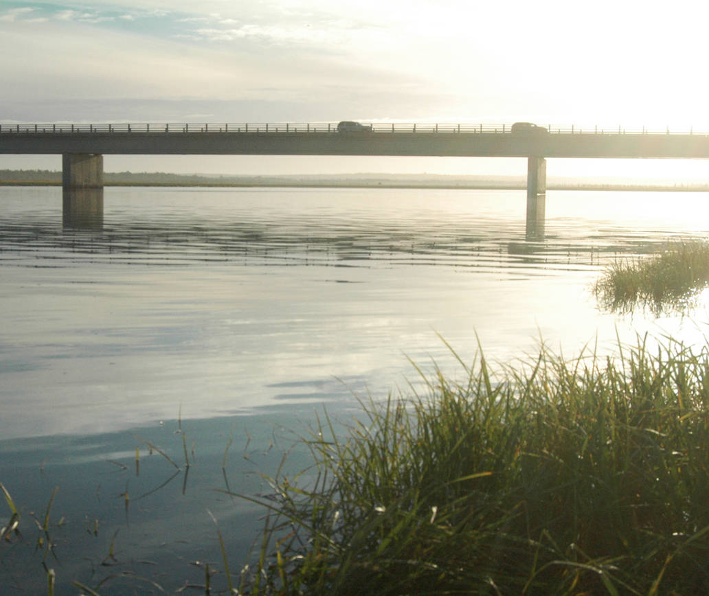 Cars pass over the Warren Ames Bridge over the Kenai River on Wednesday, Aug. 15, 2018 in Kenai, Alaska. (Photo by Elizabeth Earl/Peninsula Clarion)