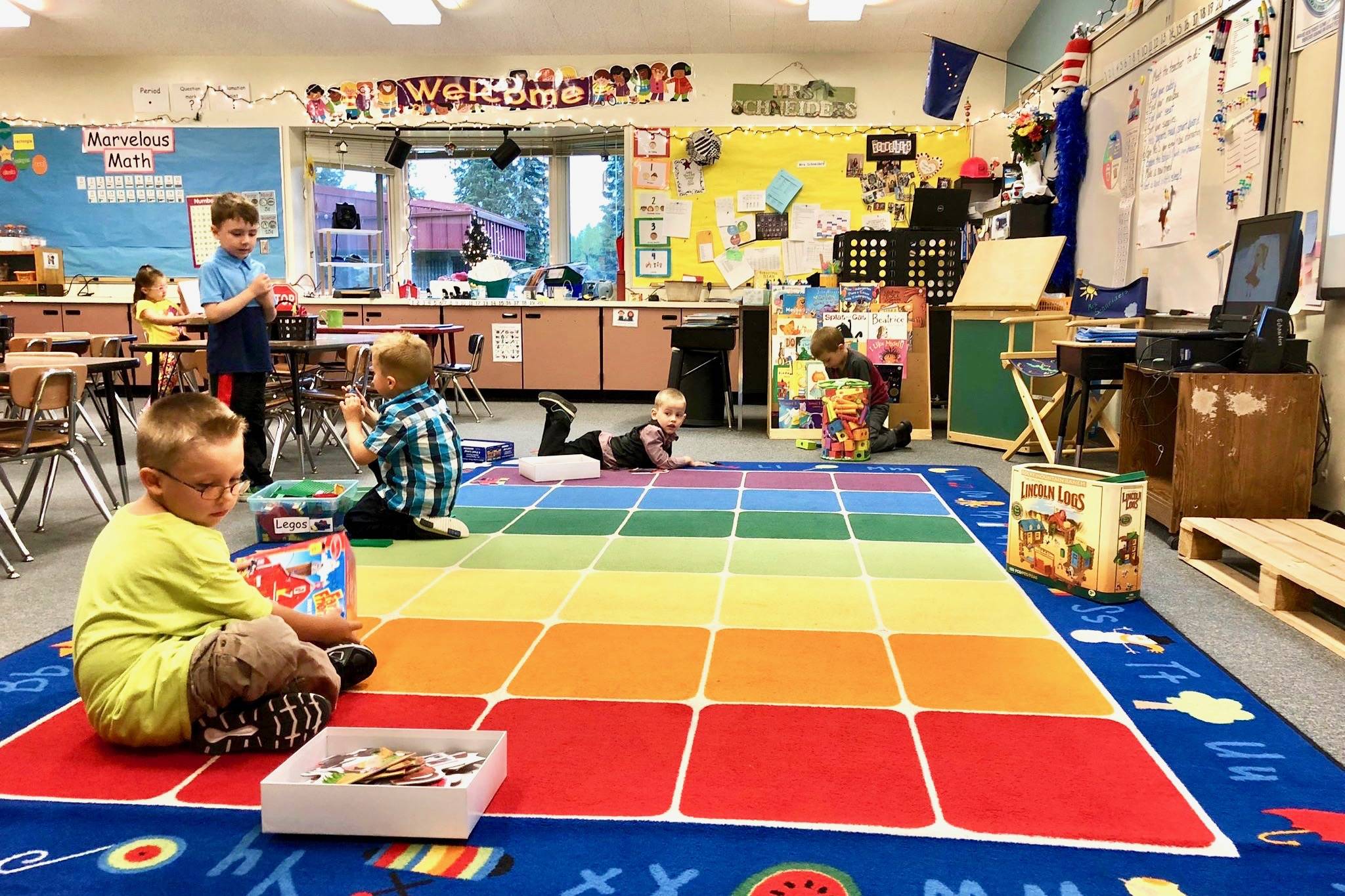 Elementary students get comfortable in their new classrooms on the first day of school, Tuesday, Aug. 21, 2018, at Mountain View Elementary in Kenai, Alaska. (Photo by Victoria Petersen/Peninsula Clarion)