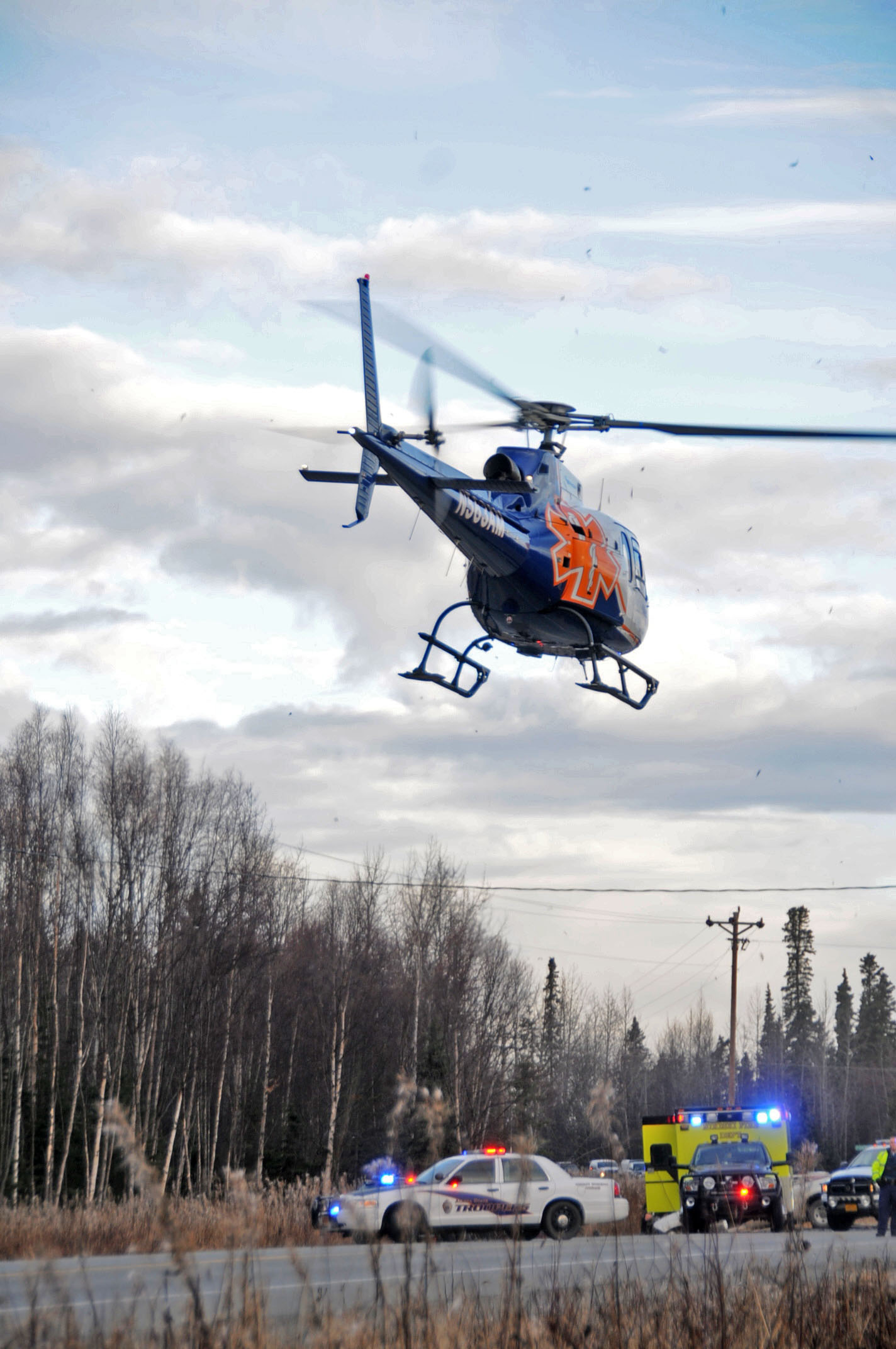 A LifeMed Alaska helicopter landed on the Kenai Spur Highway to evacuate one of the drivers after a motor vehicle accident Friday morning.