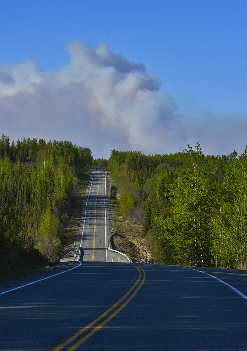 This Division of Forestry photo shows smoke from the Funny River Horse Trail fire Monday evening.