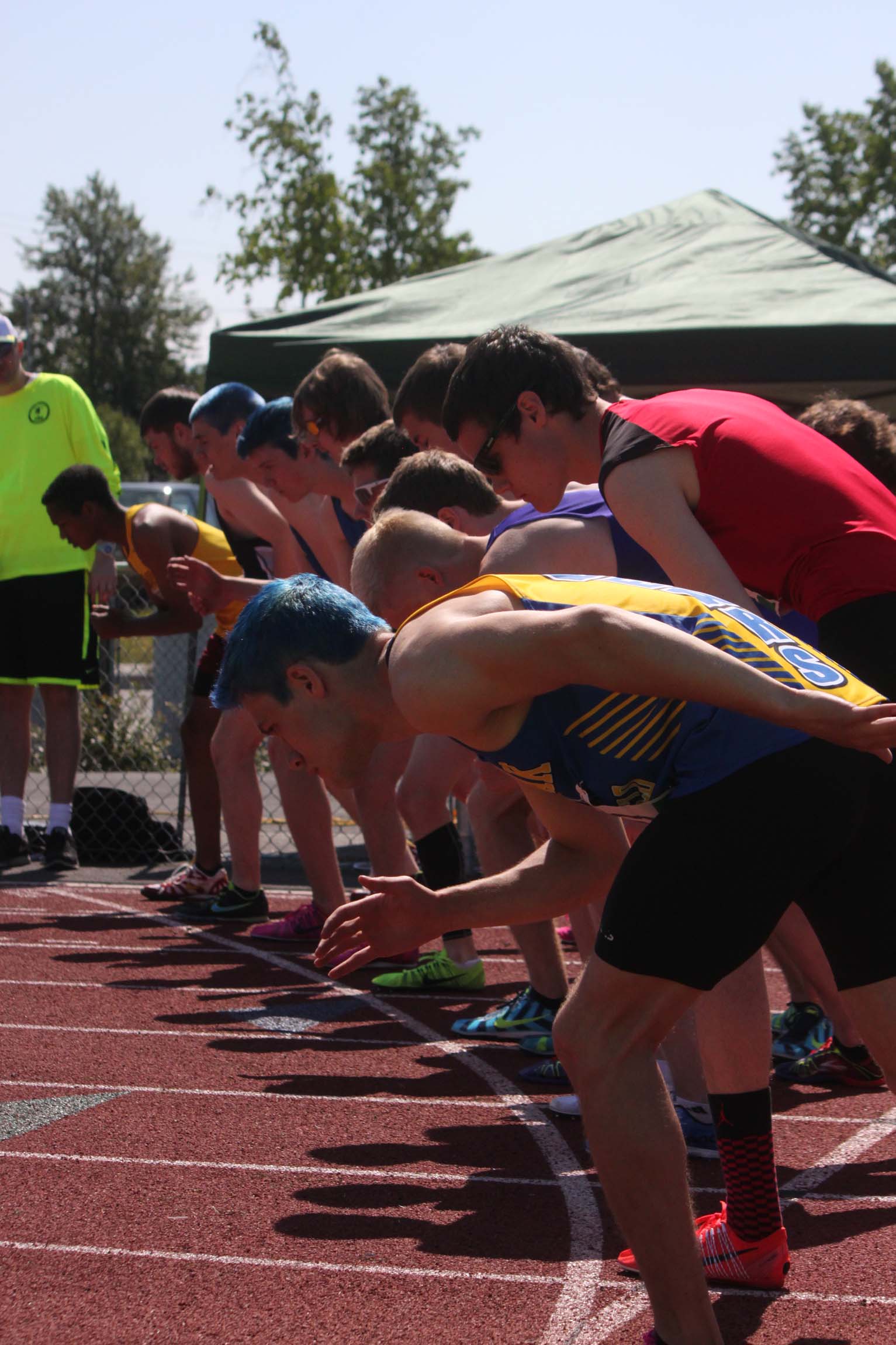 Kodiak senior Levi Thomet (foreground) prepares to take off in the 4A boys 3,200-meter race at the Alaska state track and field meet at Dimond Alumni Field in Anchorage.