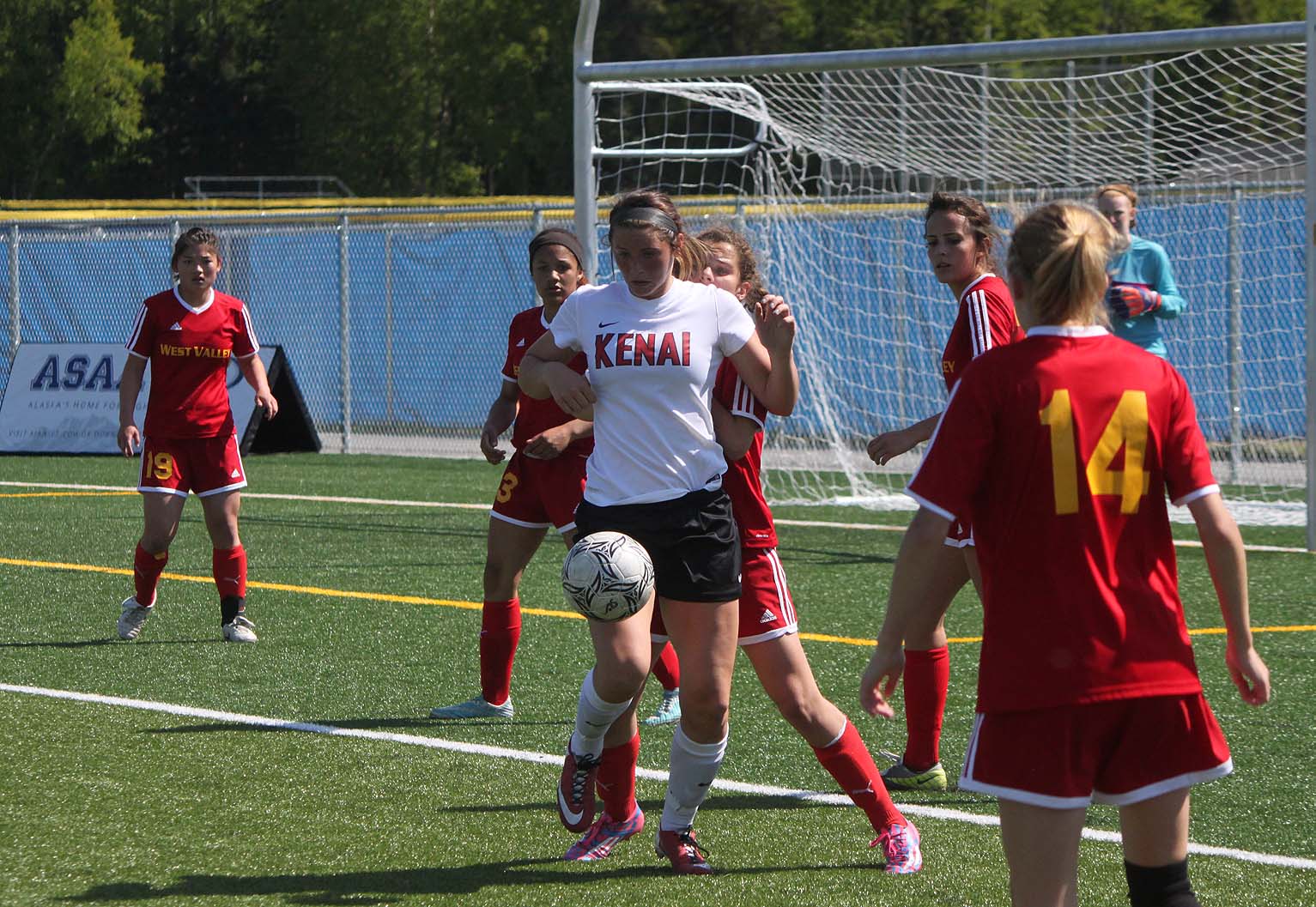 Kenai sophomore Lara Creighton works to find a scoring opportunity in Friday's state soccer semifinal round at Bartlett High School in Anchorage. The Kardinals lost 2-0.