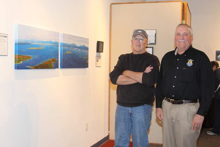 KNWR Mgr. Andy Loranger & wildlife photographer Tom Collopy at Voices of the Wilderness opening at KVCC.