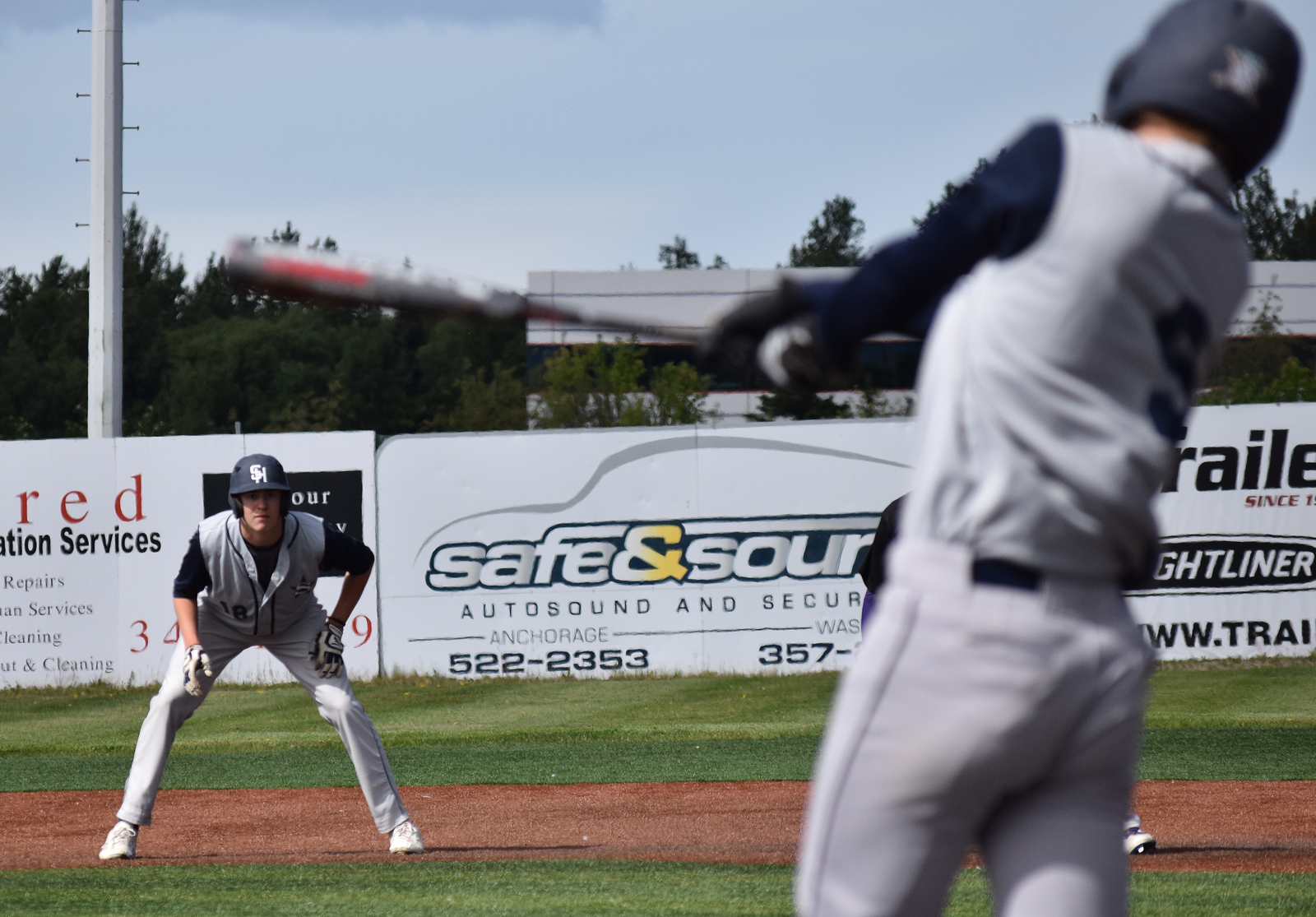 Soldotna senior Joey Becher watches intently while teammate Brandon Crowder swings at a pitch, Friday at the state baseball tournament at Mulcahy Field in Anchorage.