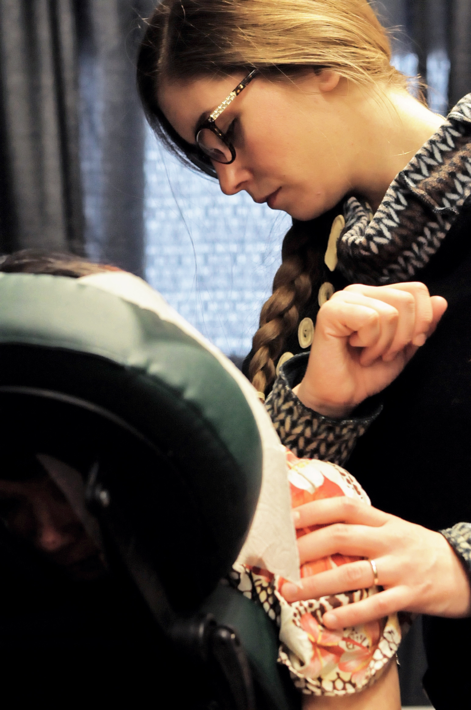 Sandra Groller gets a massage from Caitlin Sparks, the owner of Kenai Peninsula Massage Therapy, at the Project Homeless Connect event at the Soldotna Regional Sports Complex on Tuesday, Jan. 24, 2017 in Soldotna, Alaska. Sparks, who shared a booth with Heather Rasch of Mountain Magic Massage, was one of 34 providing services to those experiencing homelessness or near homelessness at the event, now in its 6th year. By noon, vendors said things had started off a little slow but were beginning to pick up, and some who had been there multiple years said they were seeing some new faces. Services included haircuts, massages, blood pressure checks, job searches and hot meals, among others, all for free. Attendees could get taxi rides to the event, pick up free coats, boots, hats and food to take home. (Elizabeth Earl/Peninsula Clarion)