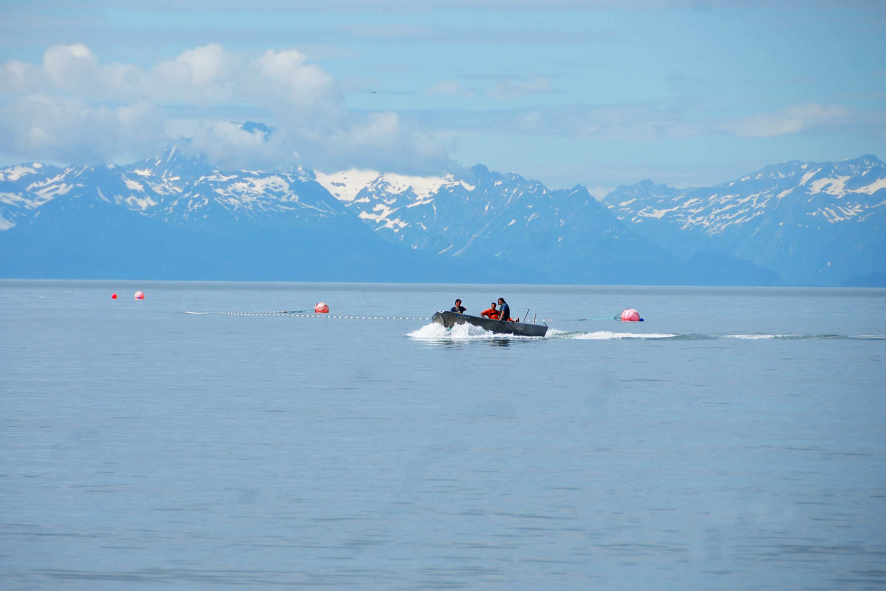 Setnetters make their way back to the beach near a site on July 11, 2016 near Kenai, Alaska. (Elizabeth Earl/Peninsula Clarion, file)