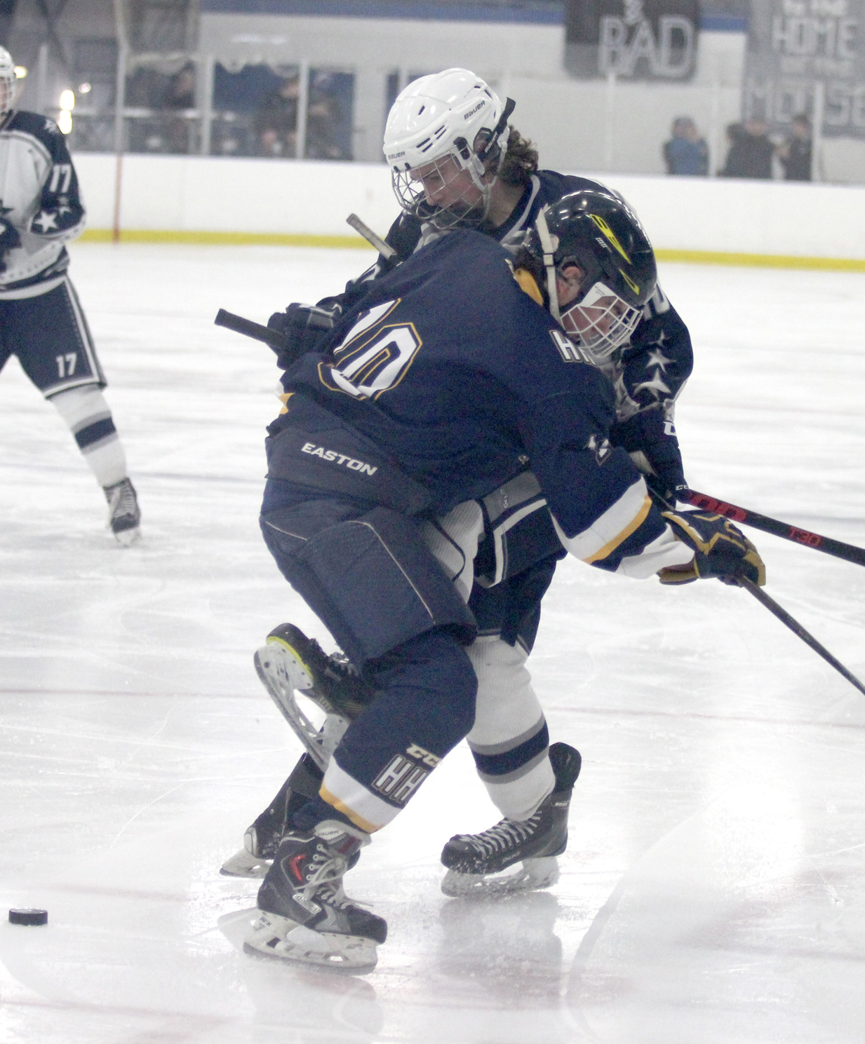 Soldotna’s Braxton Urban gets tied up with Homer’s Spencer Warren during a 2-1 win over the Marinters on the first day of the North Star Conference Championships Thursday at the MTA Events Center in Palmer. With the win, Soldotna moves forward to play second-seeded Colony in the semifinals. (Photo by Jeremiah Bartz/Frontiersman.com)