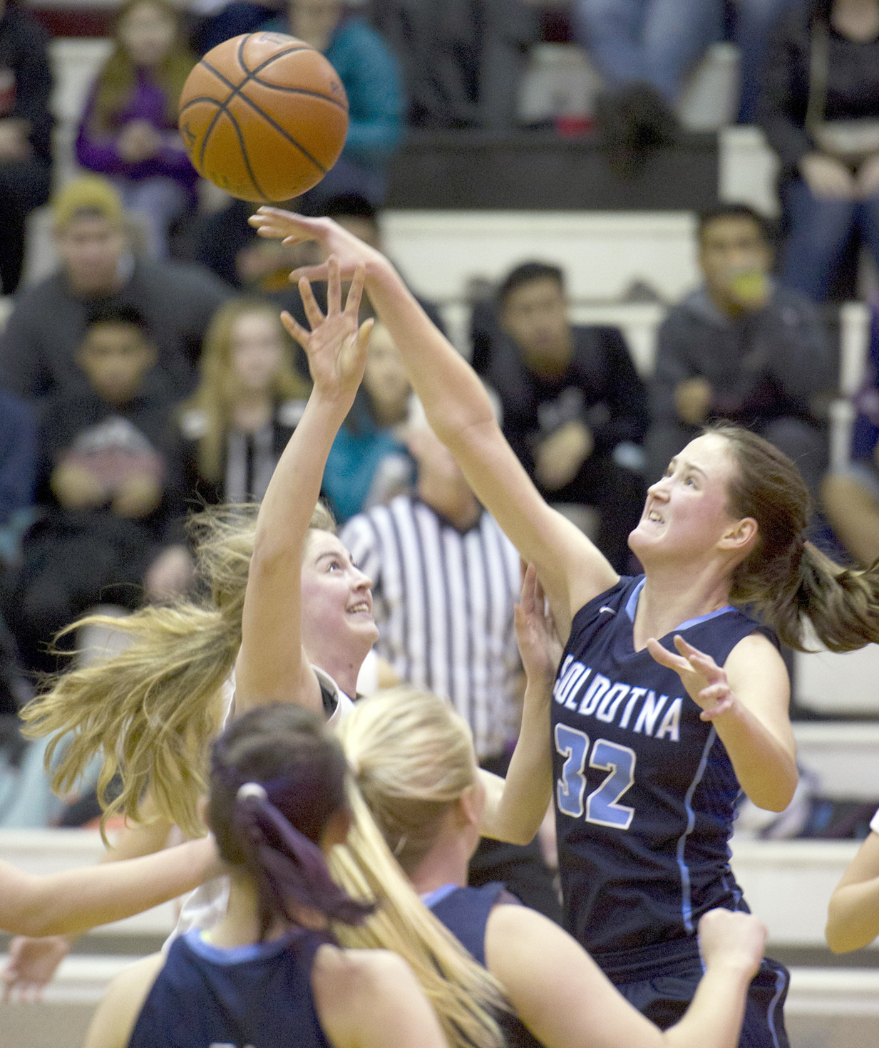 Juneau-Douglas’ Kendyl Carson, left, has her shot blocked by Soldotna’s Danica Schmidt at Juneau-Douglas High School on Friday, Feb. 3, 2017. JDHS won 48-46. (Photo by Michael Penn/Juneau Empire)