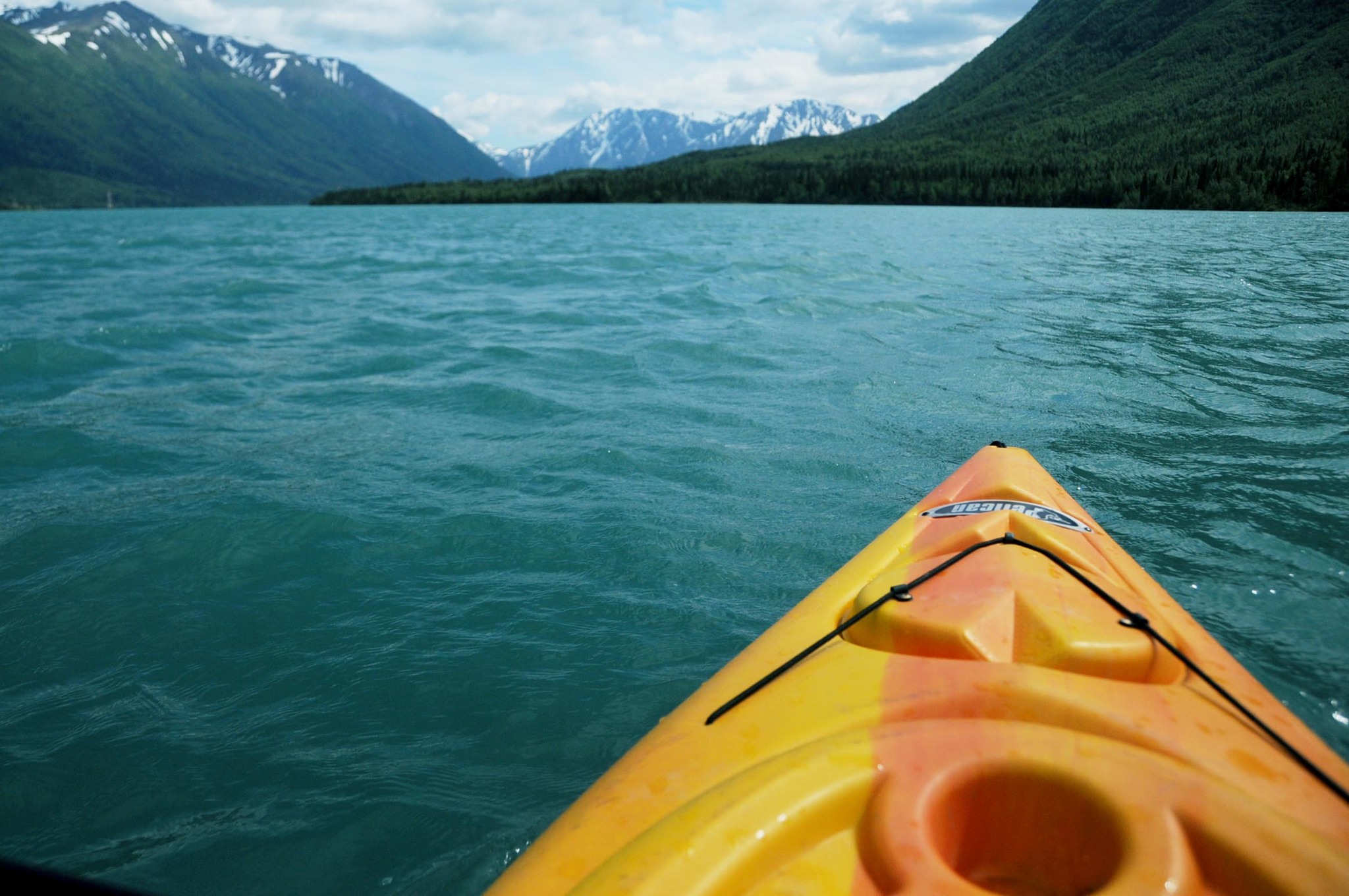 In this July 2016 photo, a kayak floats on the surface of Kenai Lake in Cooper Landing, Alaska. (Elizabeth Earl/Peninsula Clarion)