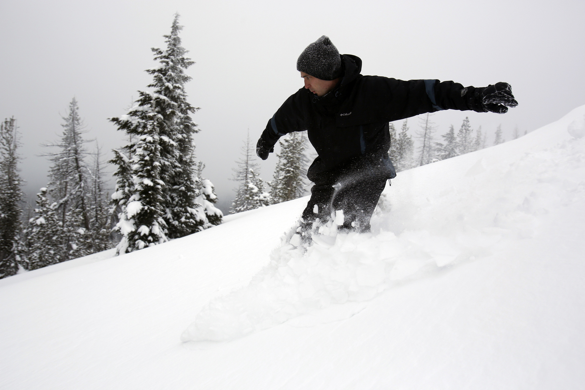 FILE - In this Feb. 6, 2014, file photo, Mark Morical carves through the heavy powder snow at the top of Vista Butte west of Bend, Ore. Some backcountry areas in Central Oregon are so accessible that it is hard to even consider them backcountry and Vista Butte is certainly one of those places. (Joe Kline/The Bulletin via AP, File)