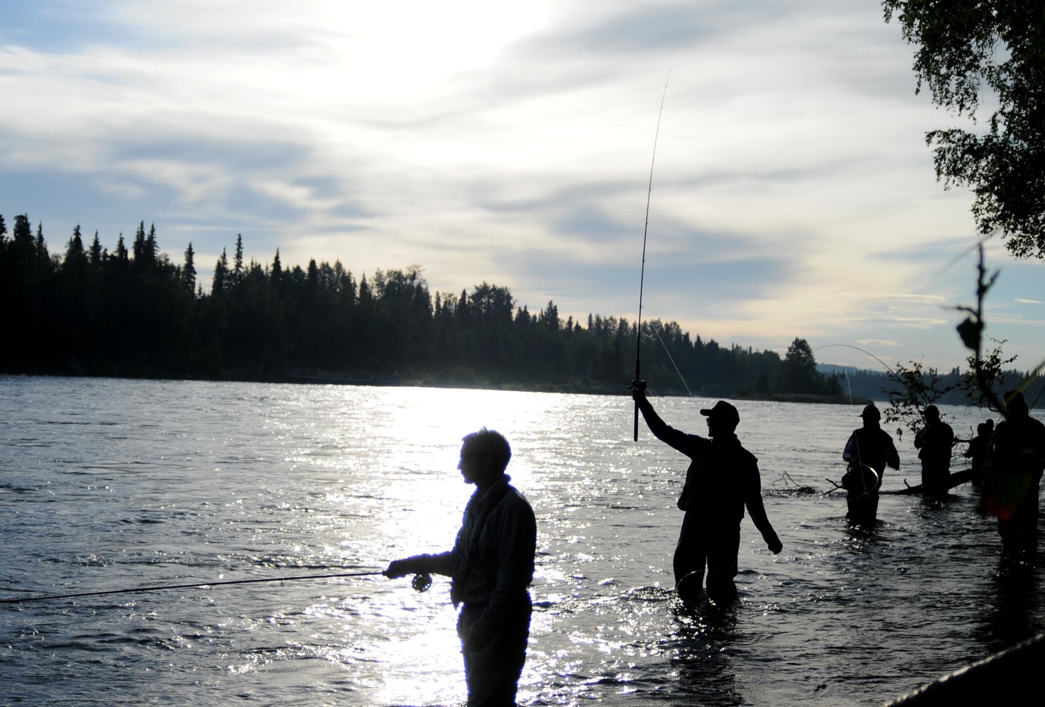 In this July 2016 photo, anglers cast their lines into the Kenai River from the bank above the Sterling Highway Bridge in Soldotna, Alaska. (Elizabeth Earl/Peninsula Clarion)