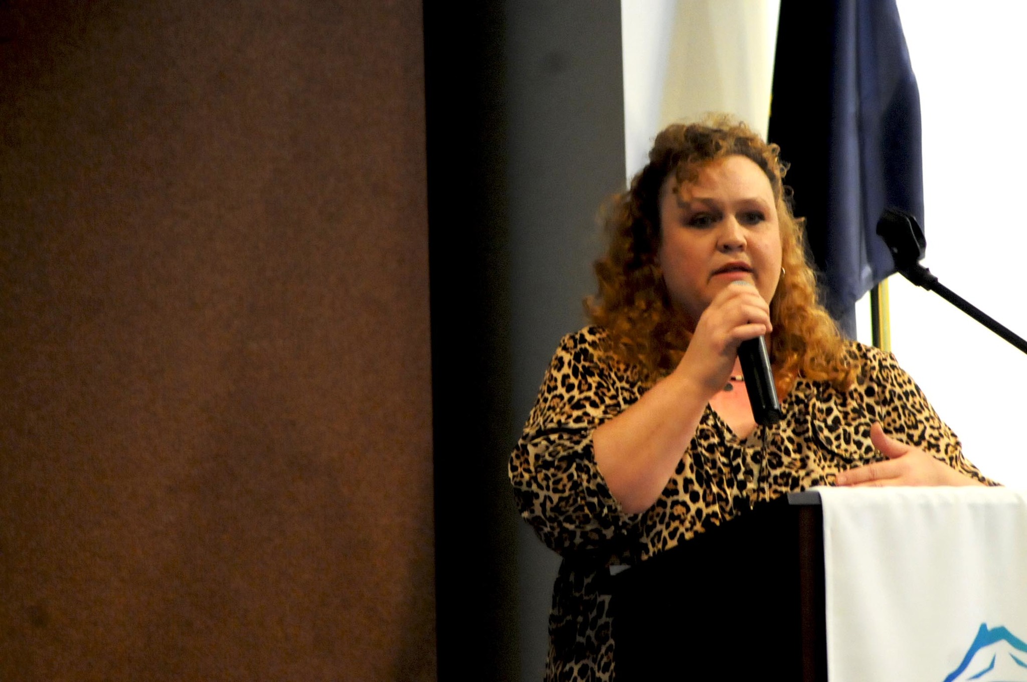 Dollynda Phelps, co-owner of limited marijuana cultivator Peace Frog Botanicals, speaks to the Kenai Chamber of Commerce during a luncheon about the impact of the local marijuana industry Wednesday in Kenai, Alaska. (Elizabeth Earl/Peninsula Clarion)