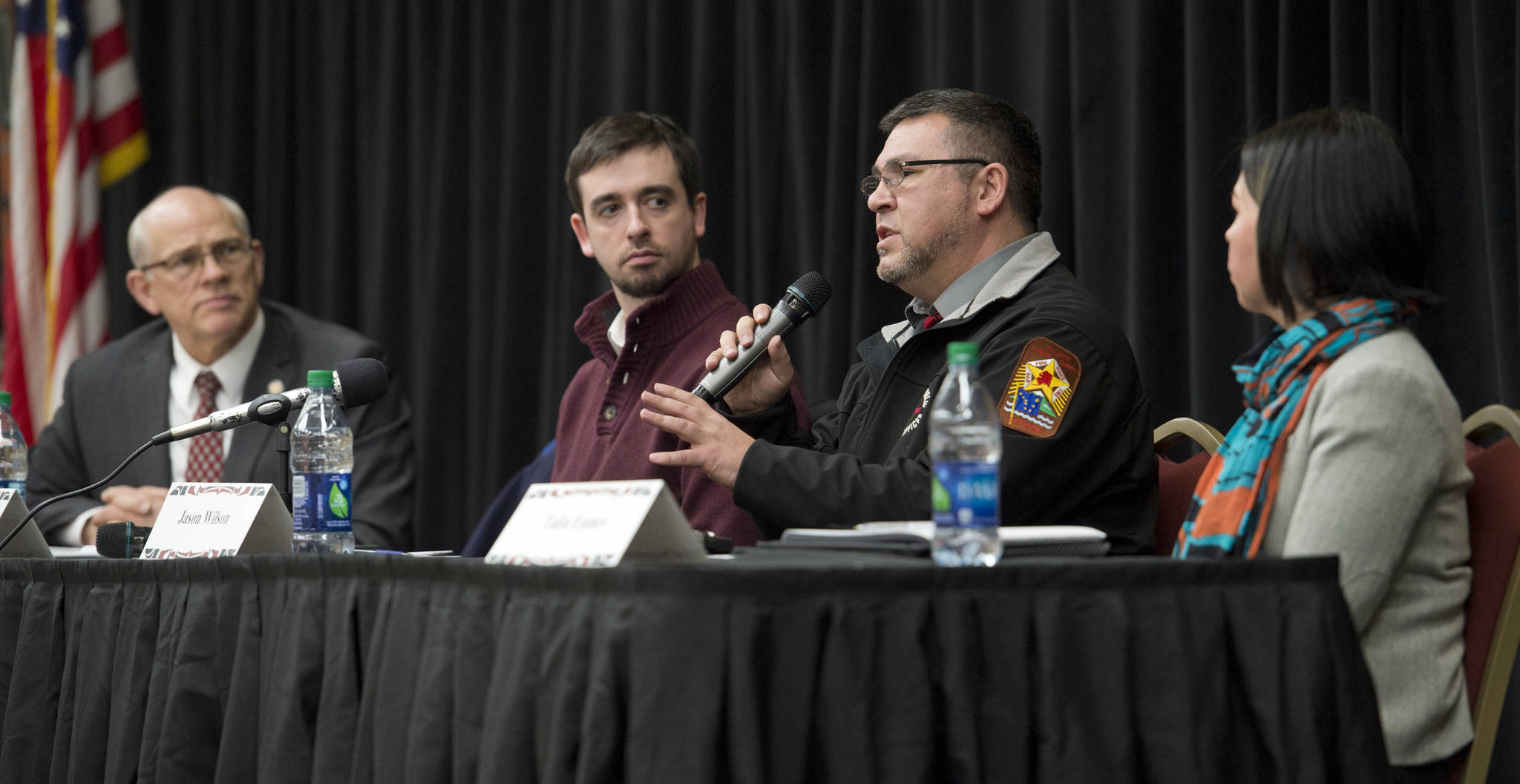 Central Council Tlingit & Haida Public Safety Manager Jason Wilson, second from right, speaks about criminal justice reform during the Native Issues Forum at the Elizabeth Peratrovich Hall on Thursday, March 2, 2017. As speaking at the forum are Sen. John Coghill (SB91 Bill Sponsor), left, Jordan Shilling, legislative staff member to Sen. Coghill, and Talia Eames, program coordinator for Central Council’s Second Chance Reentry program and chair to Juneau Reentry Coalition’s Alaska Native Community Working Group. The forum is sponsored by Central Council of Tlingit & Haida and Sealaska. (Michael Penn/Juneau Empire)