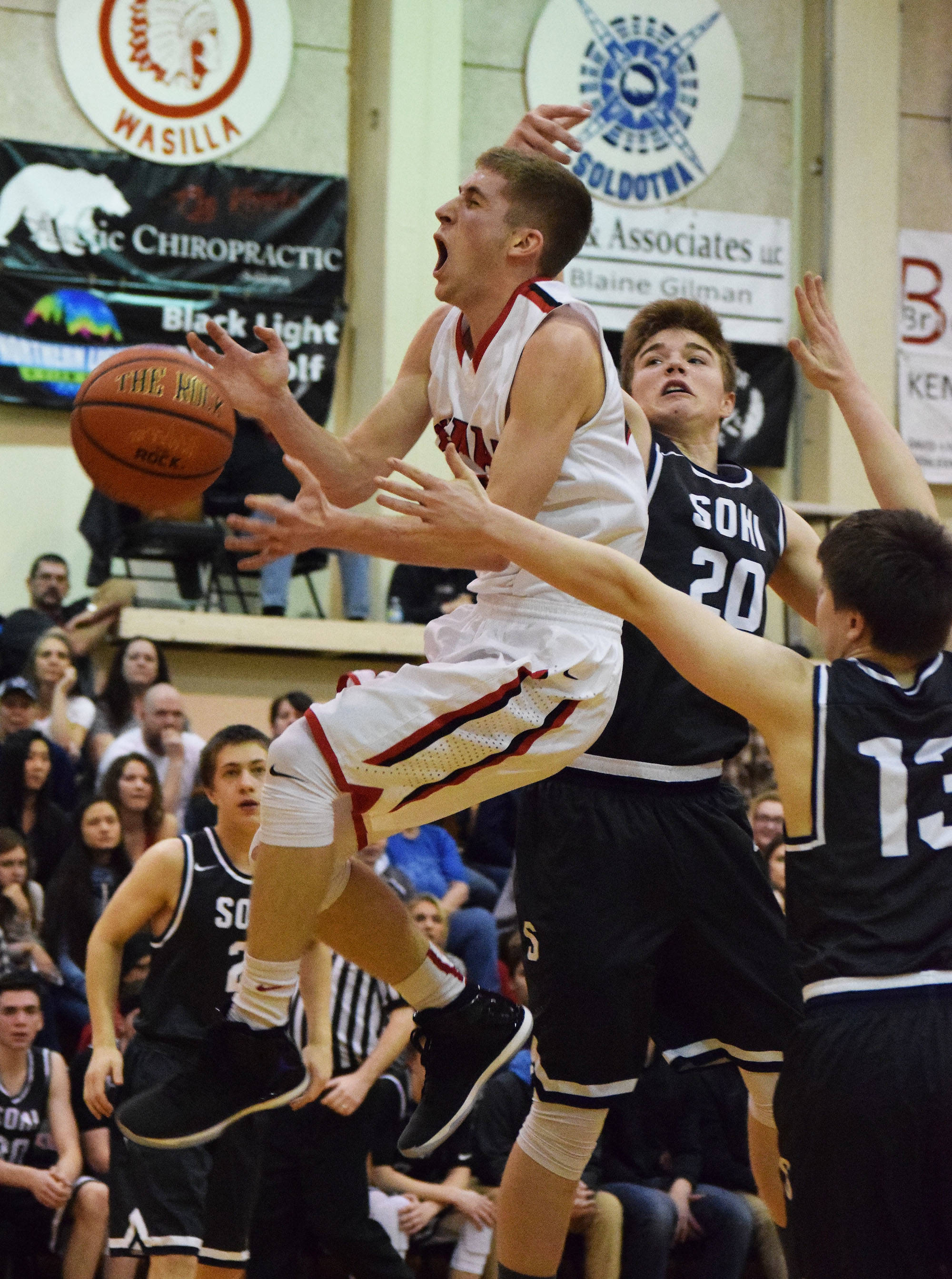 Saturday: Kenai boys, SoHi girls win on crazed Cliff Massie court