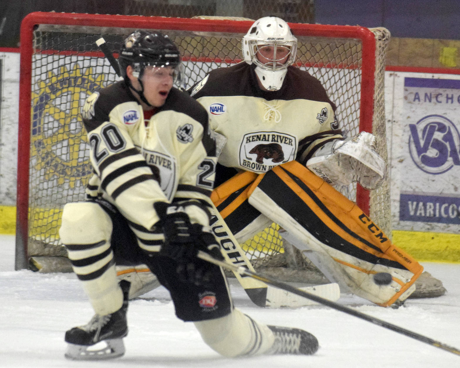 Brown Bears defenseman Shayne Monahan and goalie Robbie Goor work to keep the puck out of the net Friday, March 10, 2017, against the Coulee Region (Wisconsin) Chill at the Soldotna Regional Sports Complex. (Photo by Jeff Helminiak/Peninsula Clarion)