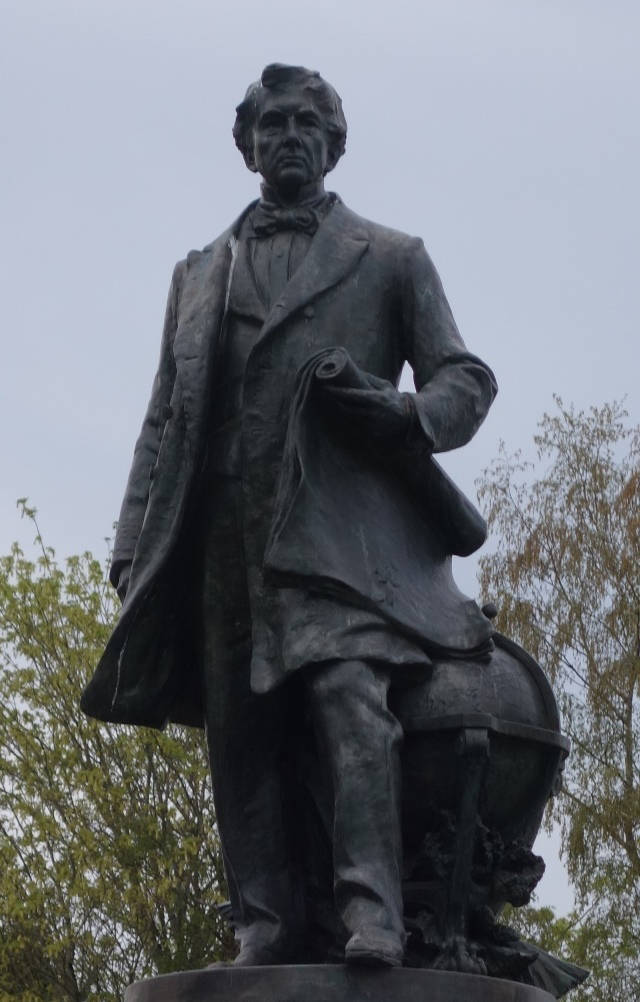 This statue of William Seward stands on a pedestal in Seattle’s Volunteer Park. The citizens of Seattle erected it in 1909, and the attached plaque cites the purchase of Alaska as the culmination of Seward’s long and useful life serving the American people. Alaska has several Seward statues including a bust in the town of Seward and a new unveiling planned for July 3 in Juneau during this sesquicentennial year. (Photo by Shana Loshbaugh)