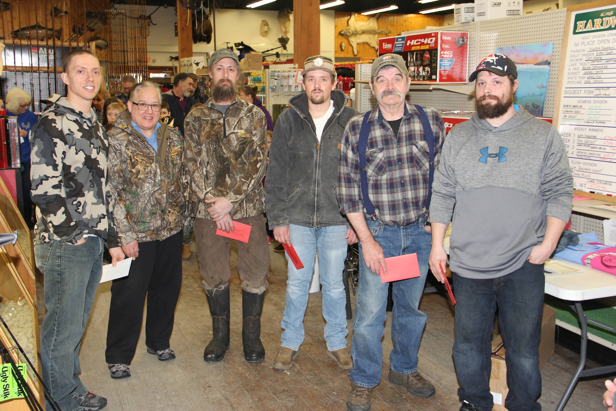 Winners in the adult divisions of Soldotna Hardware’s 20th Ice Fishing Derby.