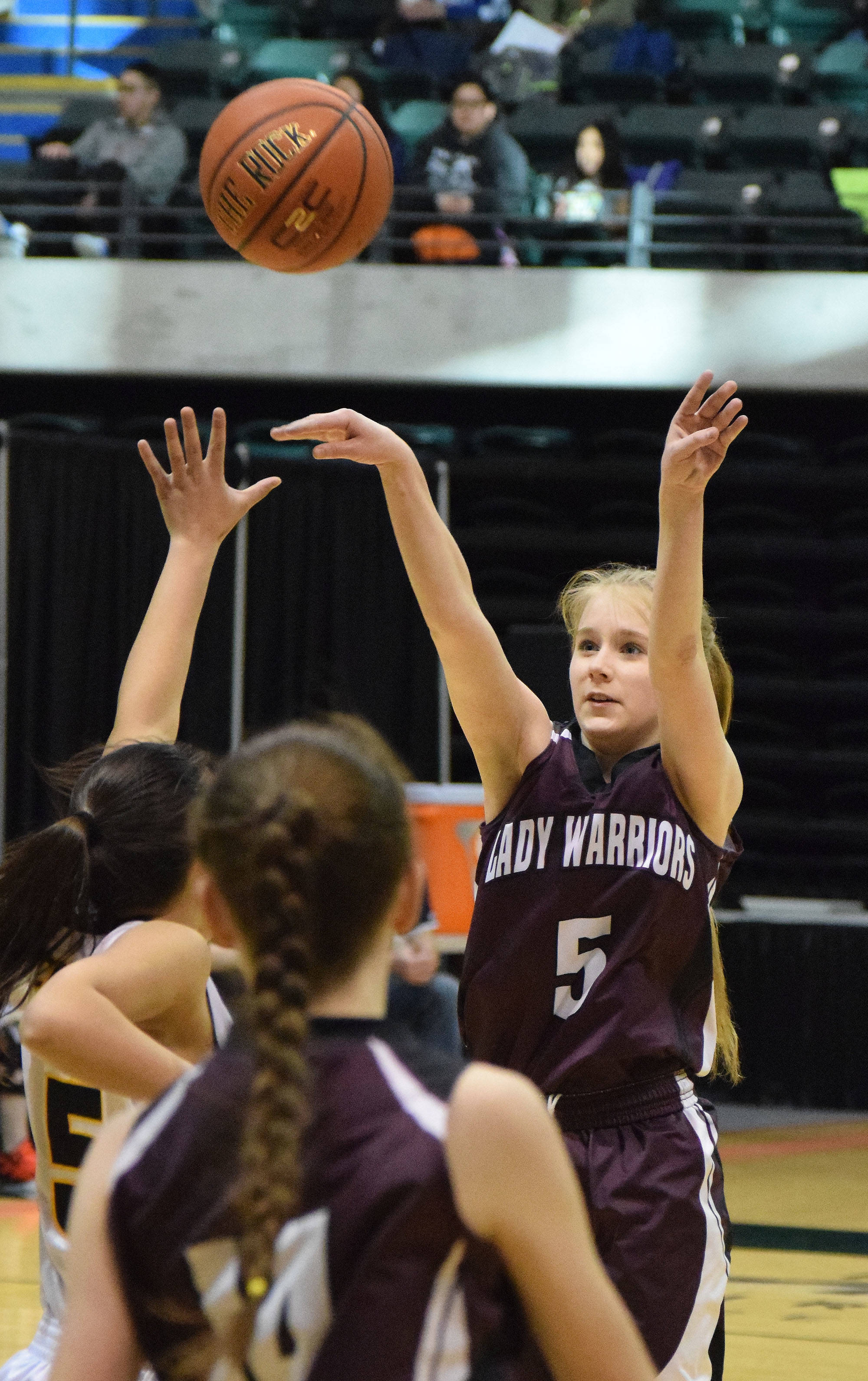 Nikolaevsk’s Markiana Yakunin shoots a 3-pointer against King Cove on Thursday, March 16, 2017, at the Class 1A state basketball tournament at the Alaska Airlines Center in Anchorage. (Photo by Joey Klecka/Peninsula Clarion)