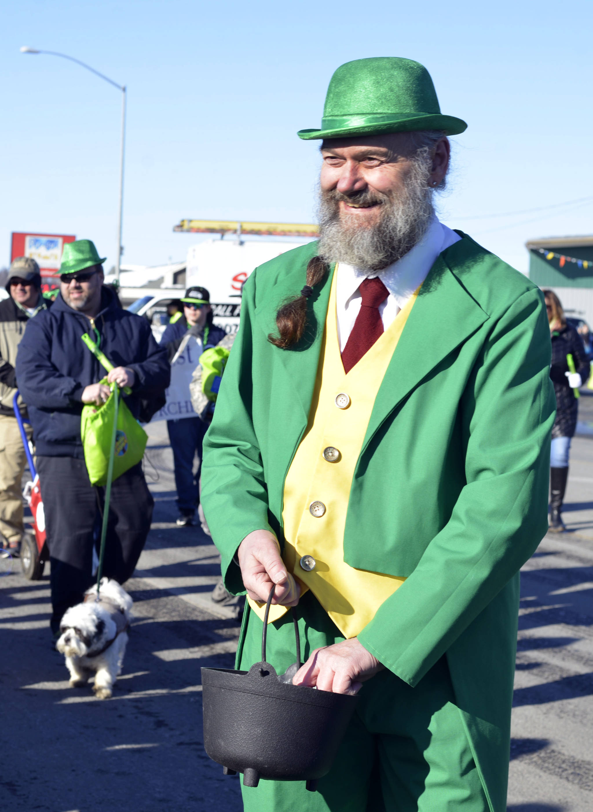 Tom Redmond distributed candy to parade goers at the Soldotna St. Paddy’s Day Parade on Friday, March 17, 2017 in Soldotna, Alaska. The parade has become a family tradition, with three generations of the Redmond family attending each year. (Kat Sorensen/Peninsula Clarion)