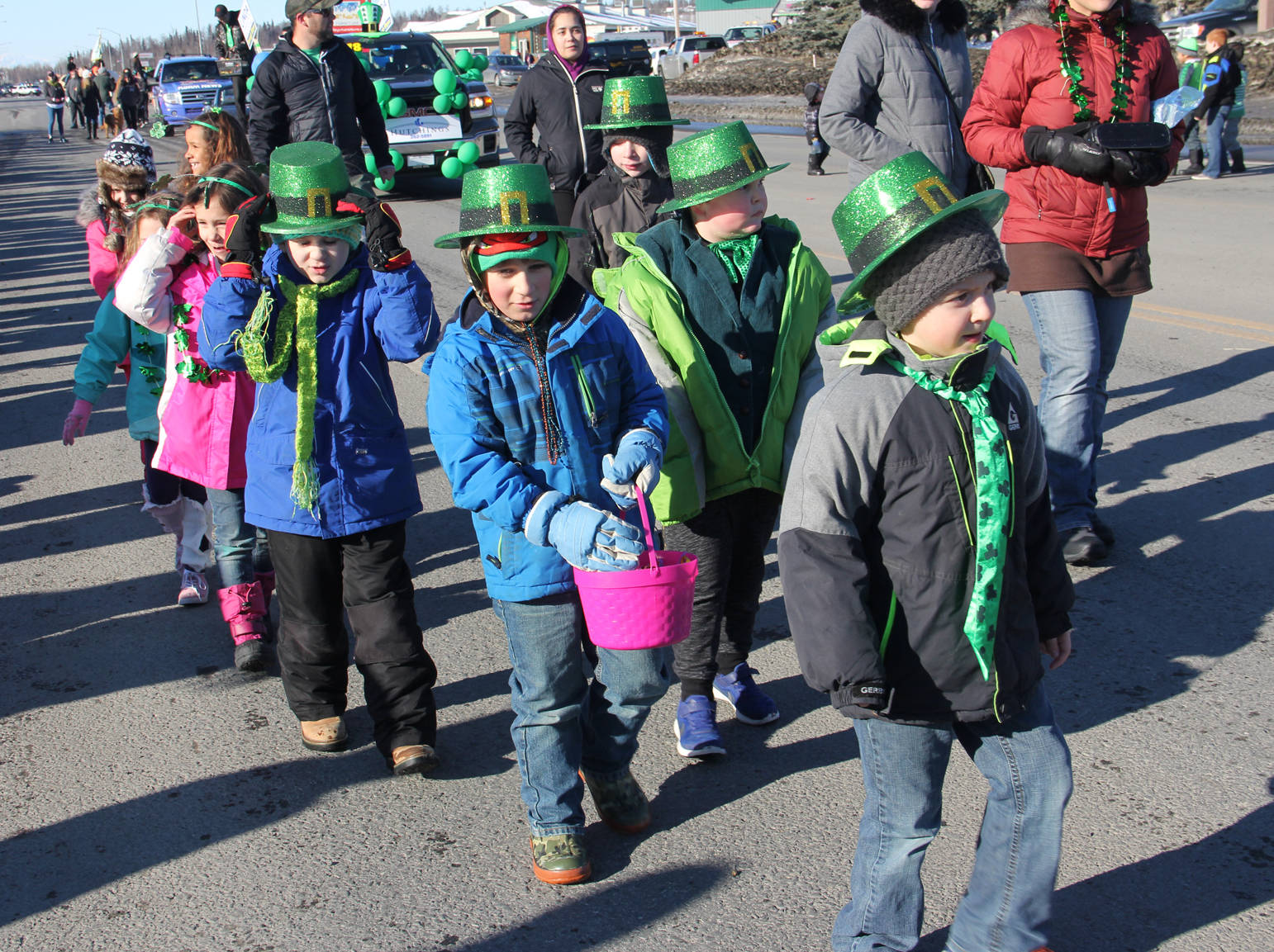Participants march in Soldotna’s St. Patrick’s Day parade.