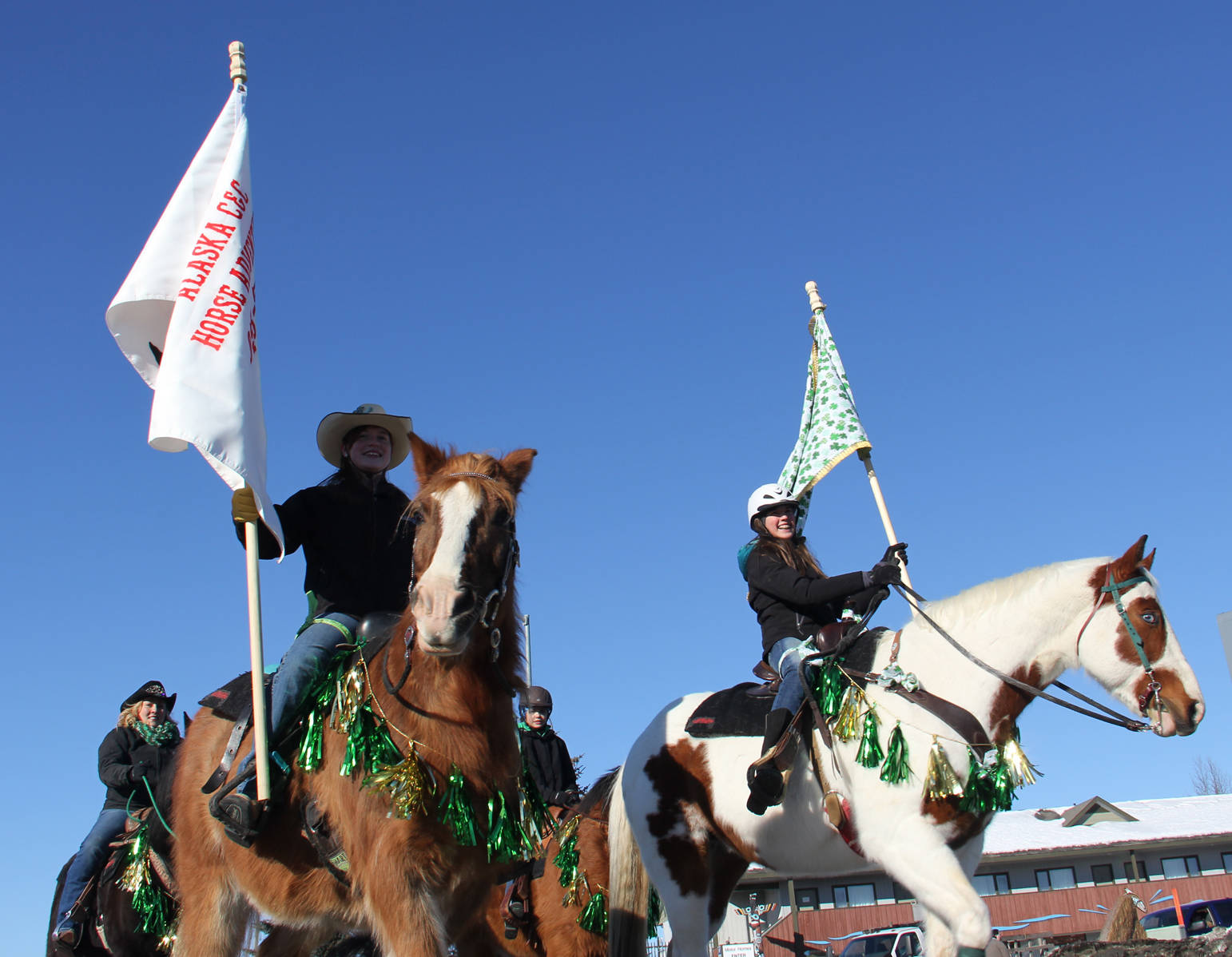 Equestrians joined the parade wearing green.