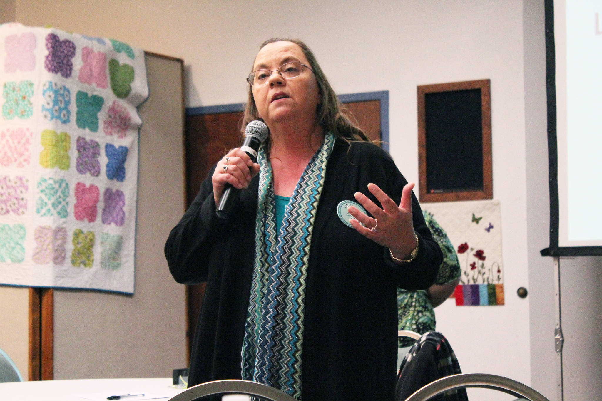 Renee Lipps of the LeeShore Center speaks to an audience about the Green Dot program that addresses violence within communities during the annual Choose Respect event Thursday, March 30, 2017 at the Kenai Chamber of Commerce and Visitor Center in Kenai, Alaska. (Megan Pacer/Peninsula Clarion)