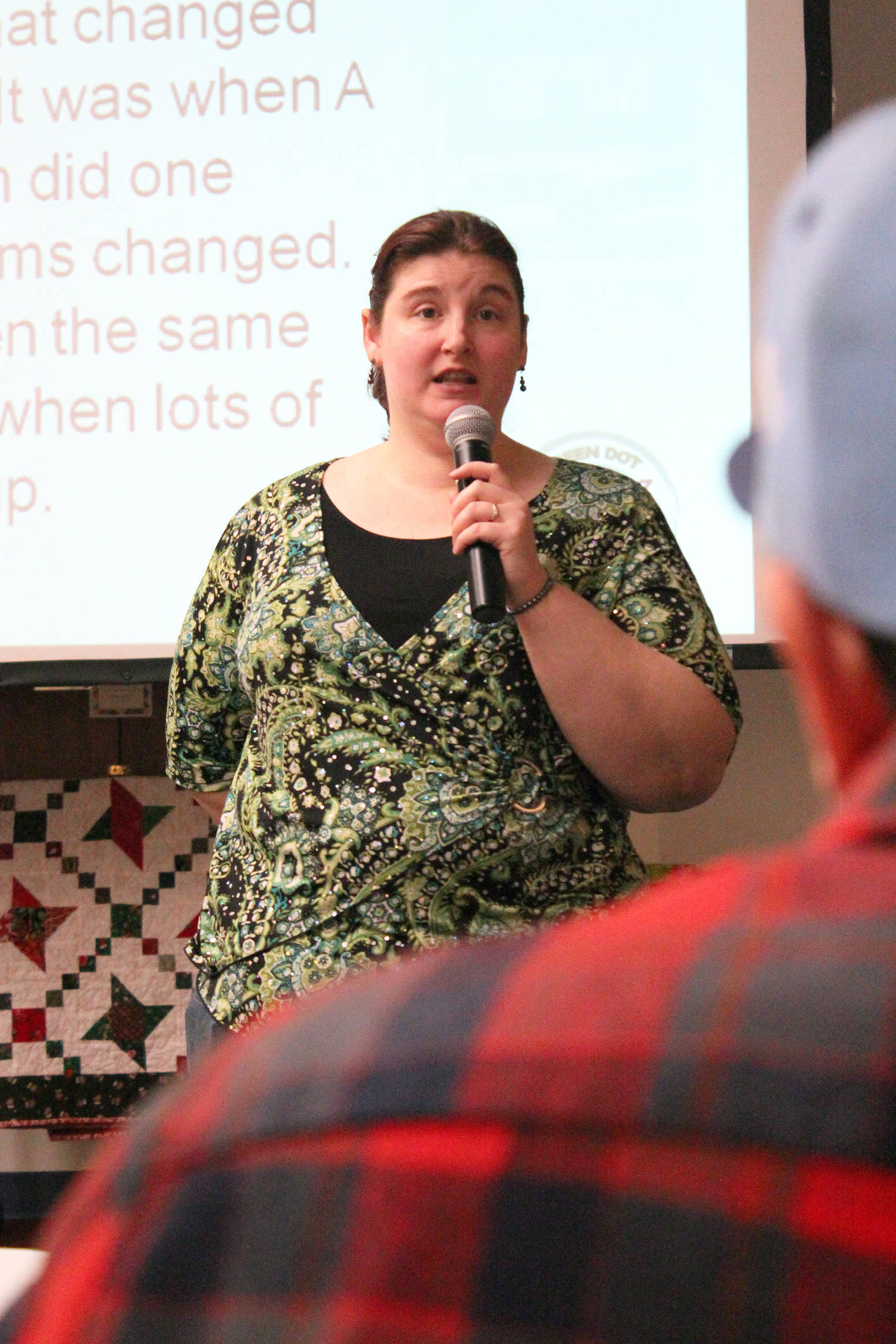 Ashley Blatchford of the LeeShore Center speaks to an audience about the Green Dot program during this year’s Alaskans Choose Respect march and event Thursday, March 30, 2017 at the Kenai Chamber of Commerce and Visitor Center in Kenai, Alaska. (Megan Pacer/Peninsula Clarion)