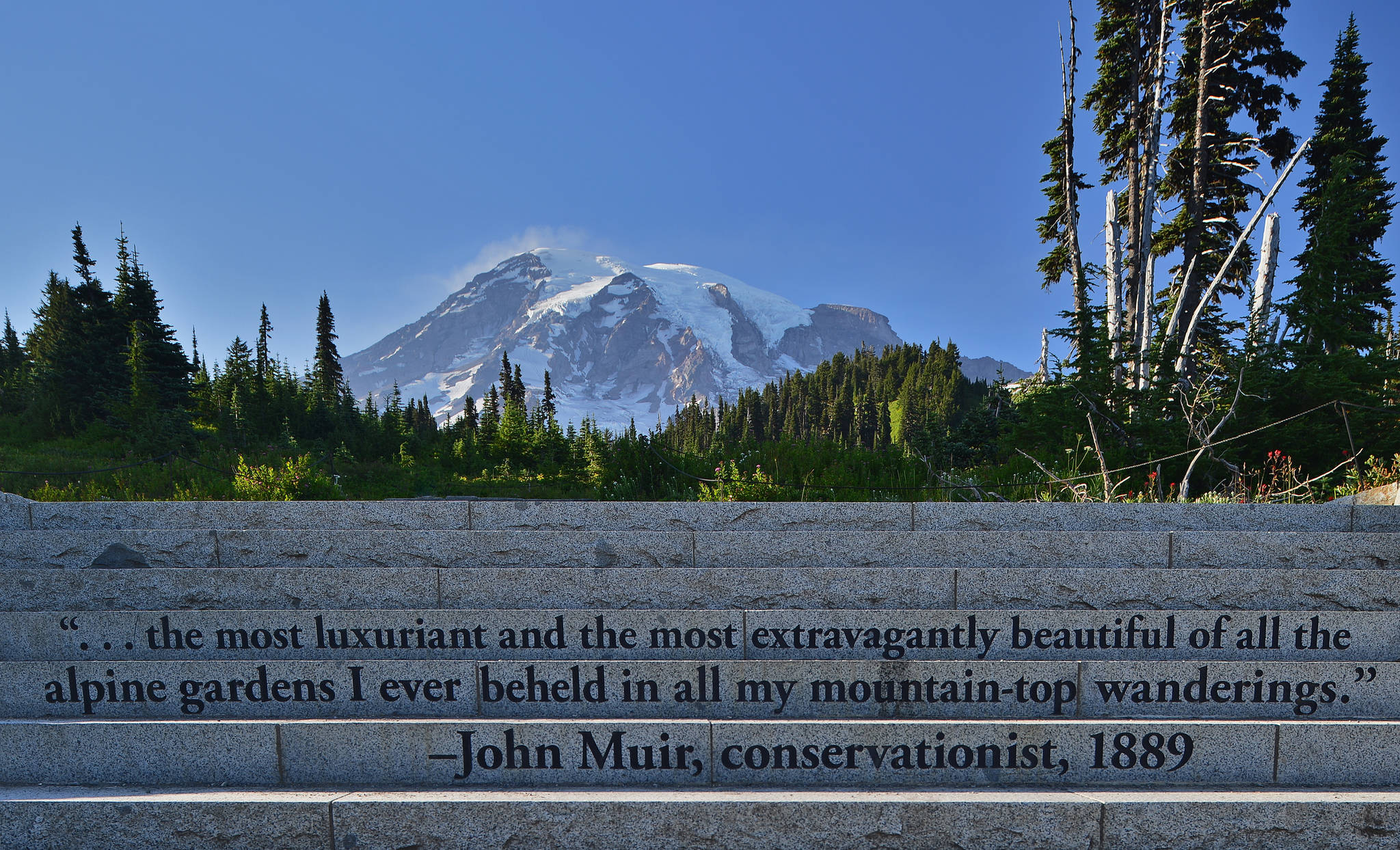 This Aug. 17, 2016 photo provided by John Chao shows the Muir Steps, Paradise area inside Mount Rainier National Park in Washington. Steps engraved with a quote from famed naturalist John Muir lead up to the Paradise area trails in the park. These are popularly referred to as the “Muir Steps.” (John Chao via AP)