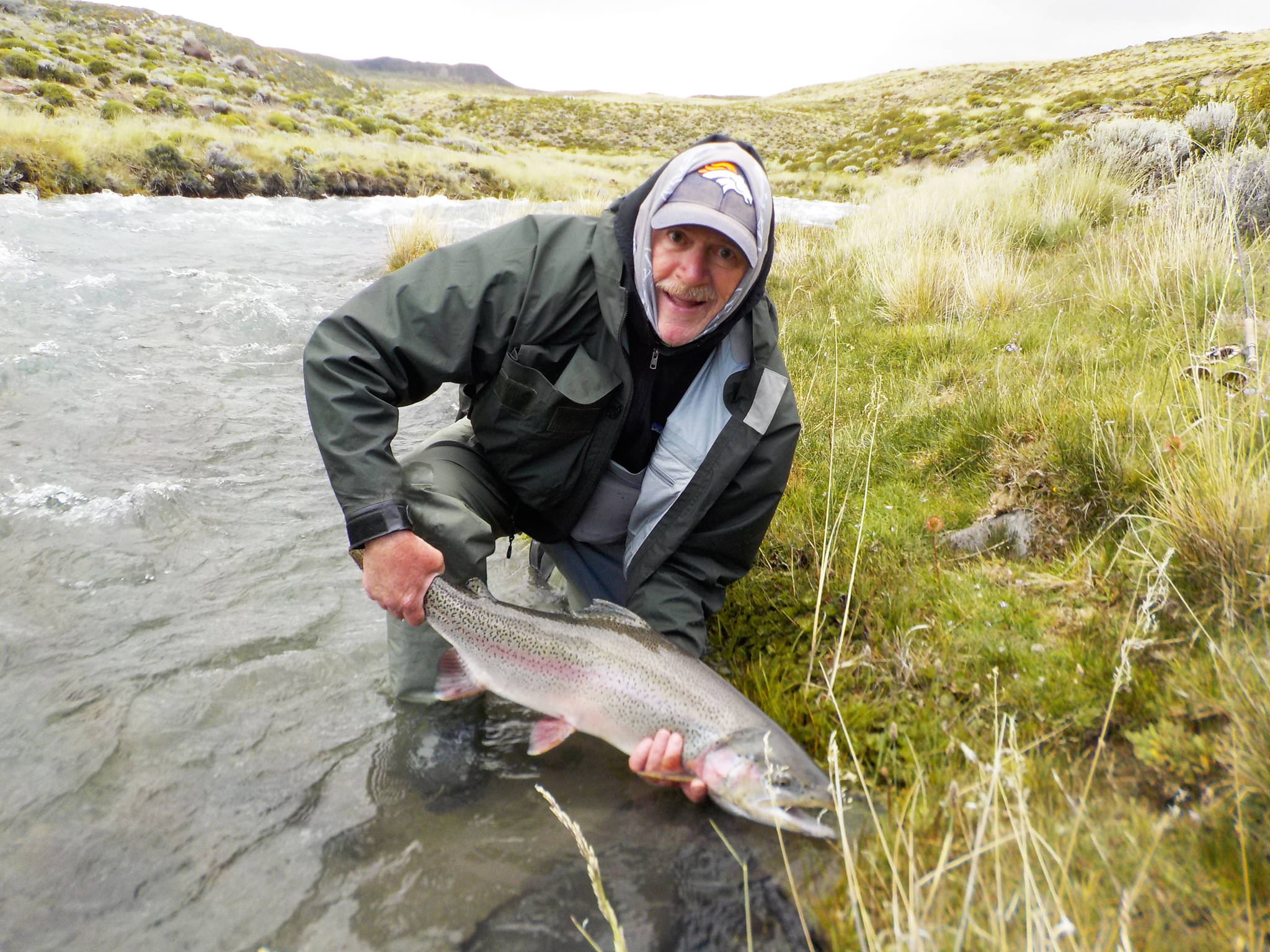 Soldotna resident Bruce King, a former fisheries biologist for the Alaska Department of Fish and Game, holds a rainbow trout he caught during a trip to Patagonia, Argentina in 2016. The areas he fished boasted trout upwards of 30 inches. (Photo courtesy Bruce King)