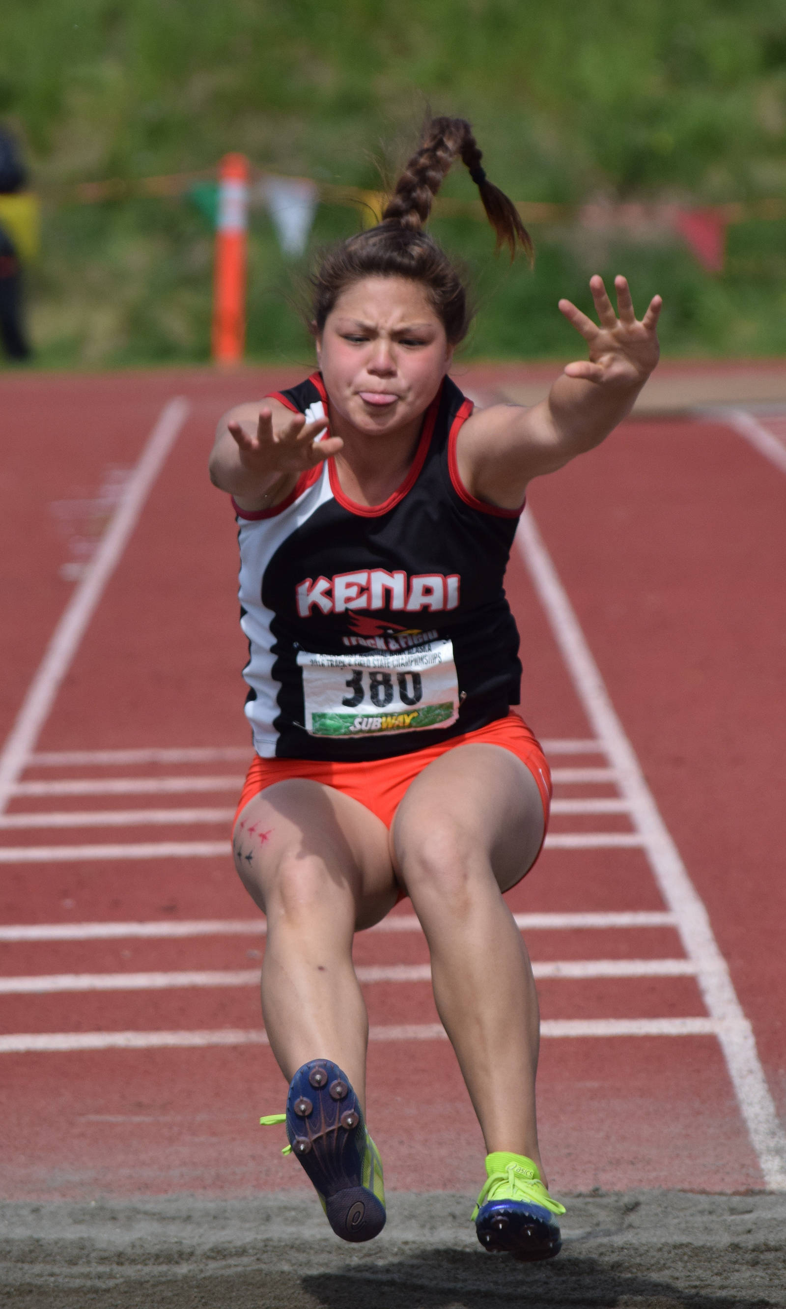 Kenai Central’s Julieanne Wilson competes in the 4A girls long jump event in May 2016 at the state track and field championships at Dimond Alumni Field in Anchorage. (Photo by Joey Klecka/Peninsula Clarion)