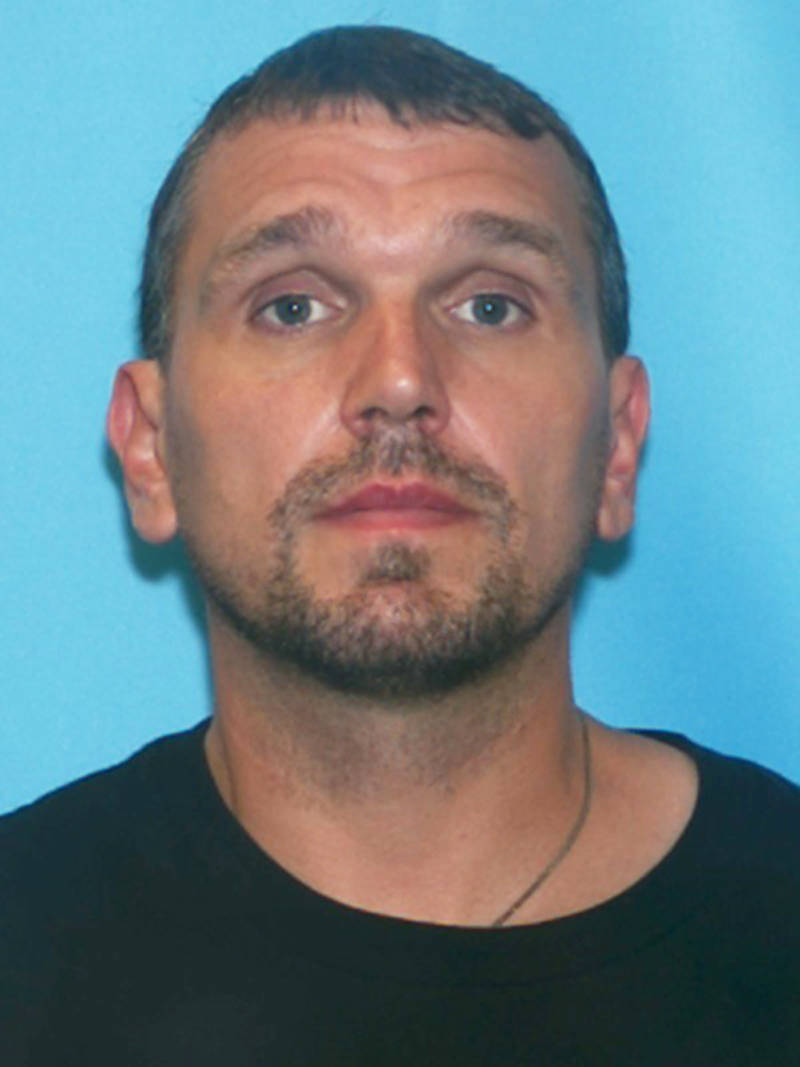 This photo posted by the Alaska State Troopers shows Casey Douglas, a 39-year-old Anchorage man on the run from authorities in Sterling, Alaska since Wednesday, April 19, 2017. (Photo courtesy Alasak State Troopers)
