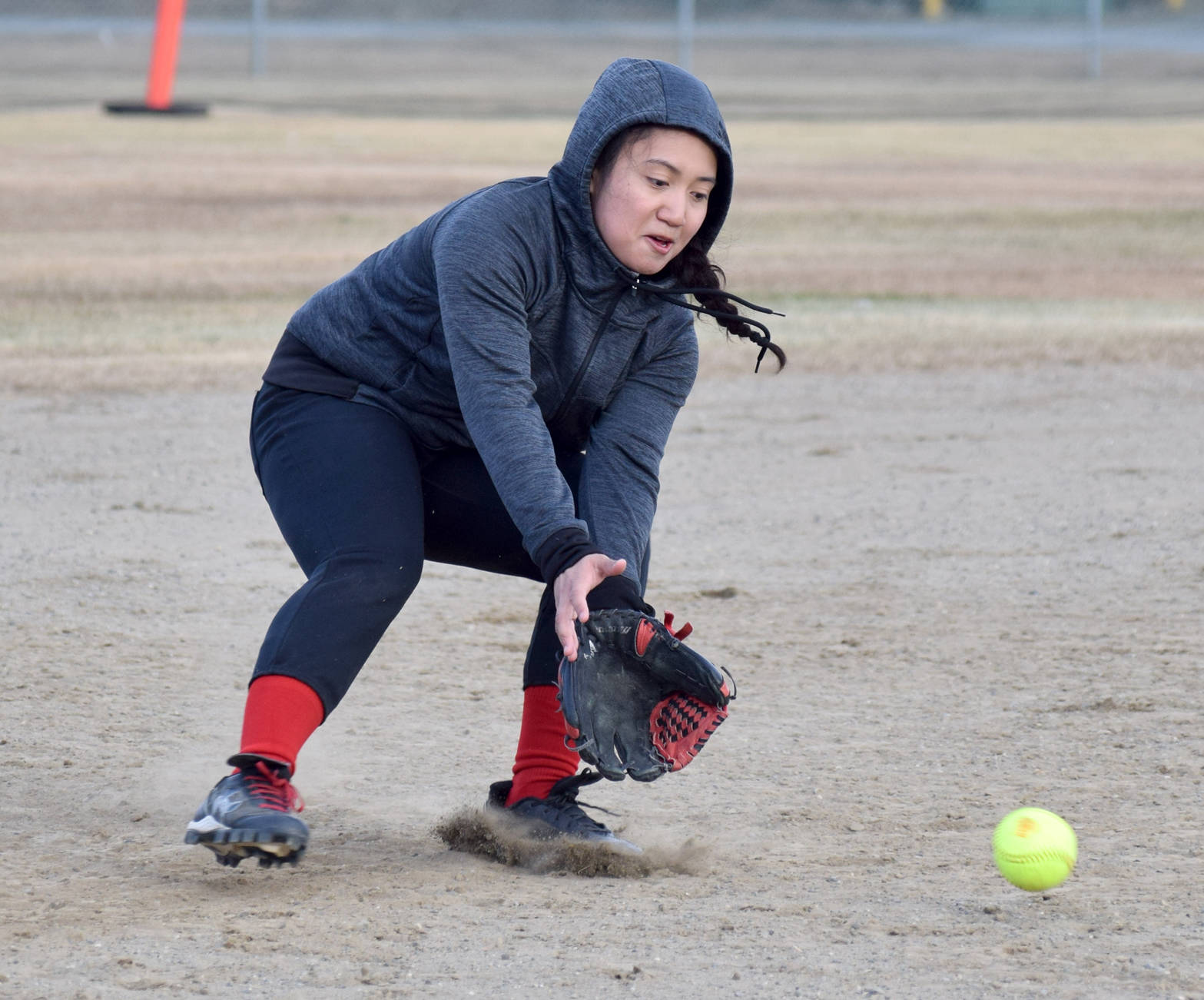 Kenai Central shortstop Patricia Catacutan fields a grounder Friday, April 21, 2017, against Wasilla at Steve Shearer Memorial Ball Park in Kenai. (Photo by Jeff Helminiak/Peninsula Clarion)