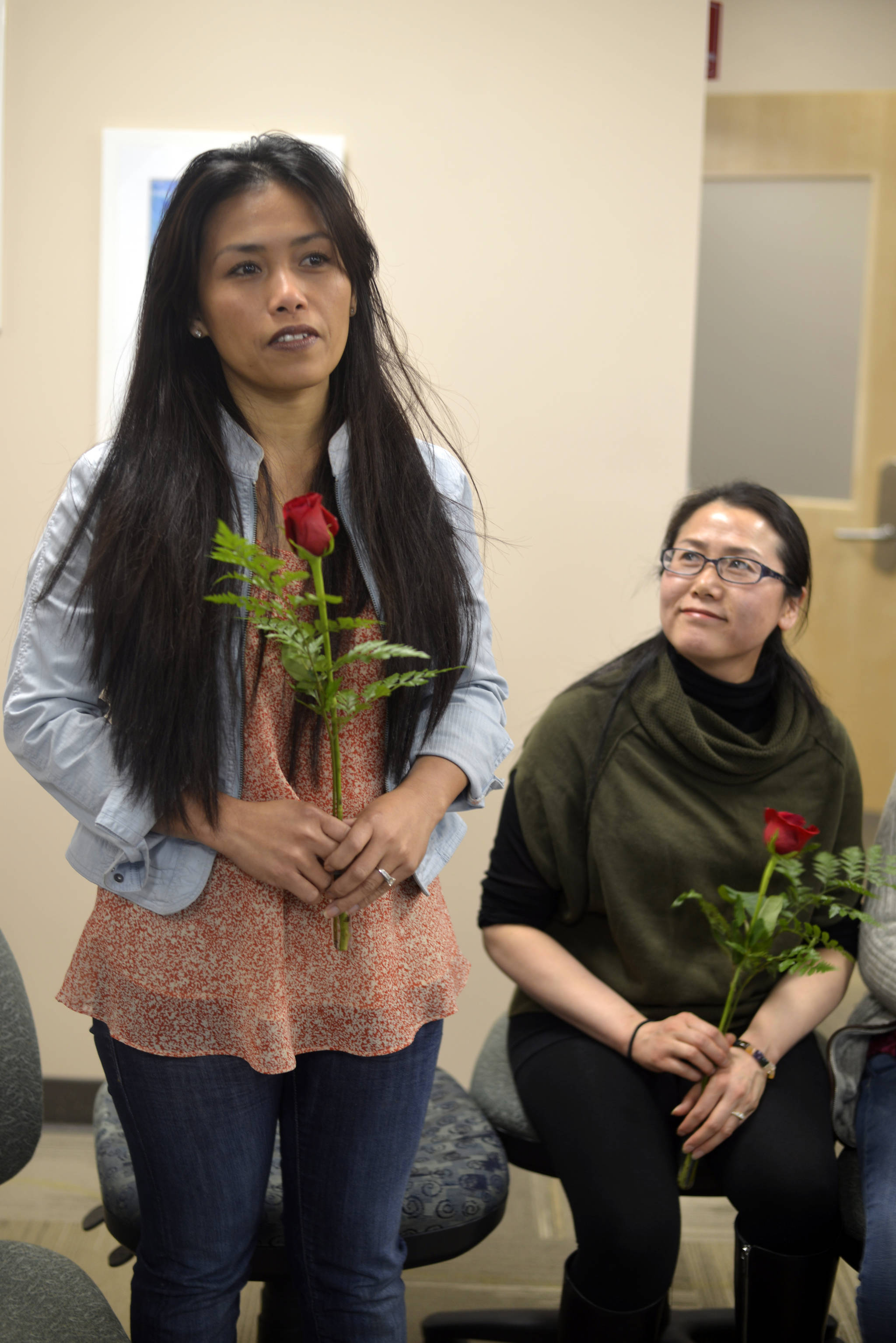 Sherly Carroll, left, and Guangyuan Ding received a scholarship honoring the legacy of ESL teacher Kathryn Christopherson. Both were honored on April 27, 2017 at Kenai Peninsula College. (Kat Sorensen/Peninsula Clarion)