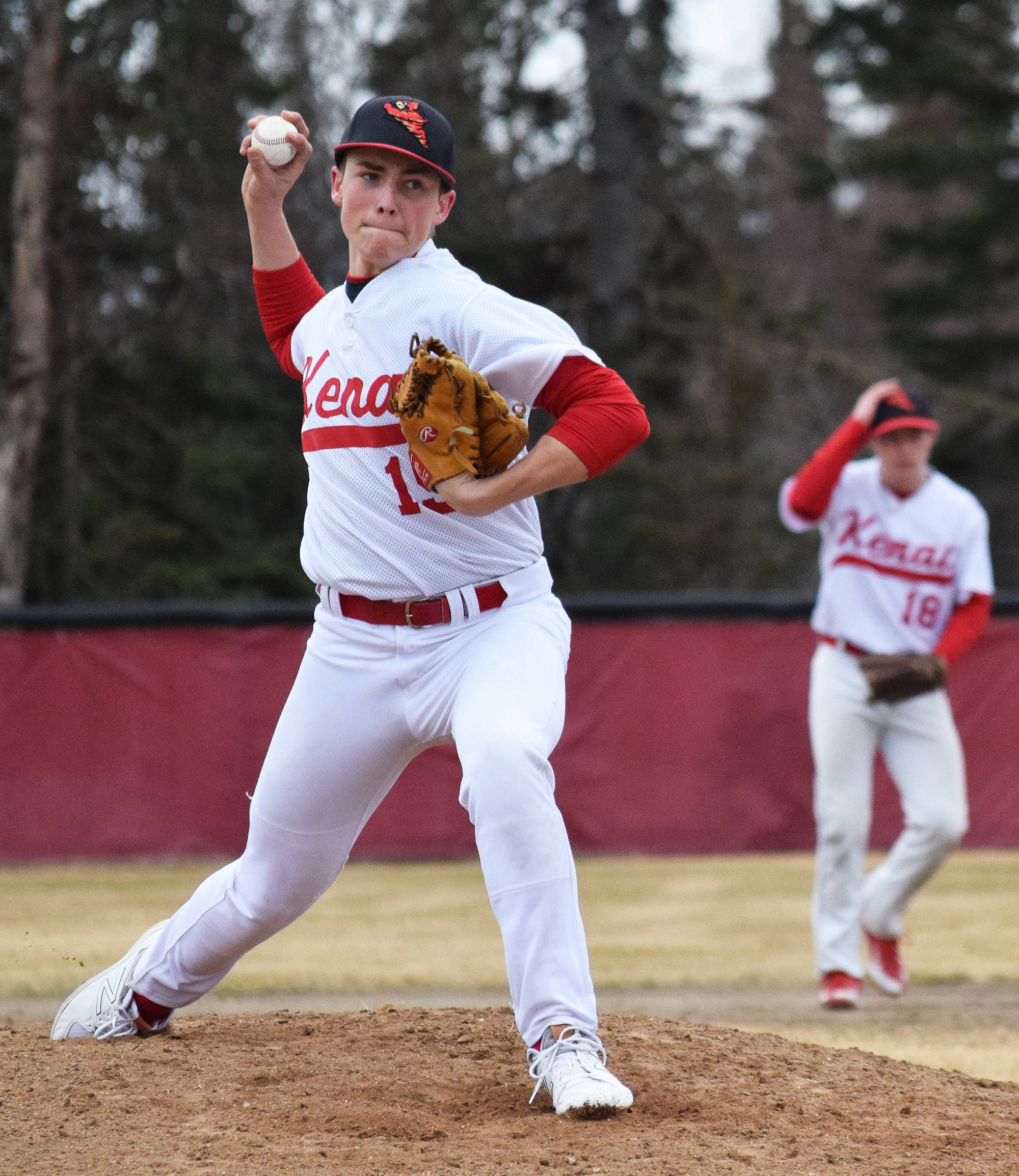 Kenai Central pitcher Gavin Pettersen winds up for the throw against a Homer batter Tuesday evening at the Kenai Little League Fields. (Photo by Joey Klecka/Peninsula Clarion)