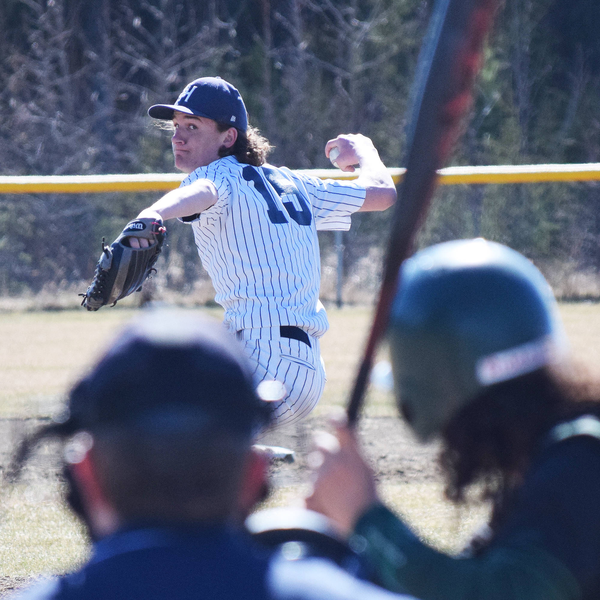 Soldotna pitcher Matthew Daugherty winds up for the throw against a Colony batter Tuesday afternoon at the Soldotna baseball fields. (Photo by Joey Klecka/Peninsula Clarion)